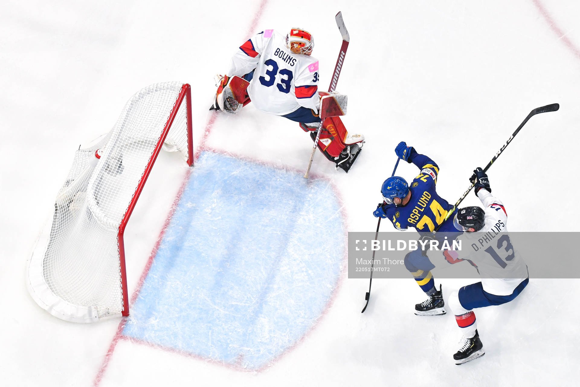 Rasmus Asplund of Sweden scores the 5-0 goal behind