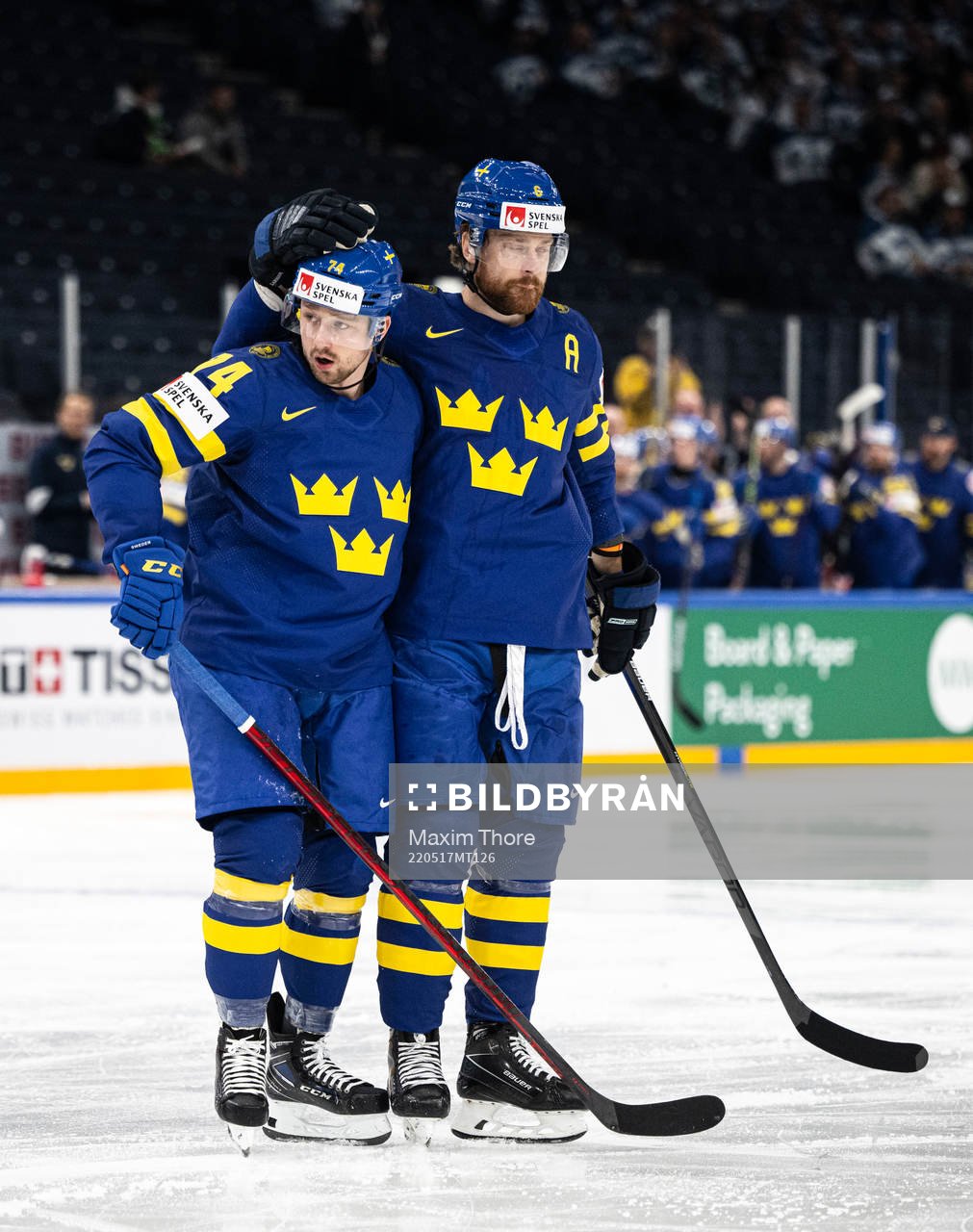 Rasmus Asplund and Adam Larsson of Sweden celebrate the 1-0