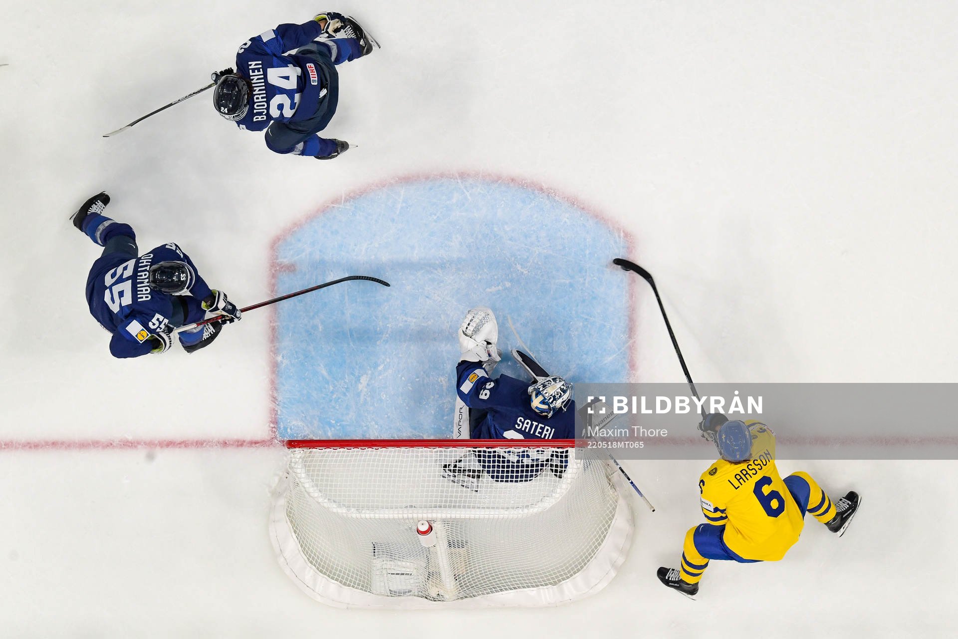 Adam Larsson of Sweden scores the 0-1 goal behind