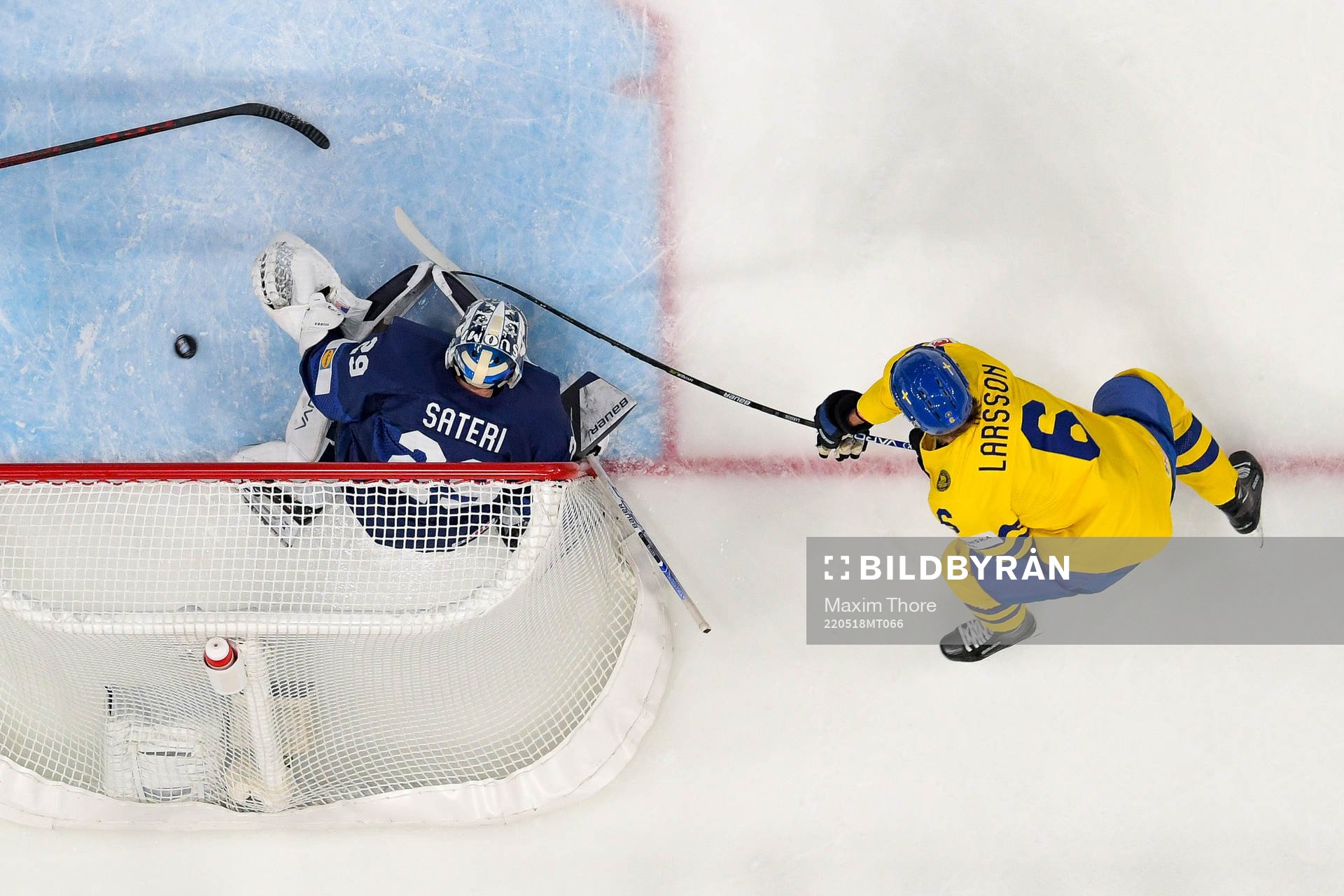 Adam Larsson of Sweden scores the 0-1 goal behind