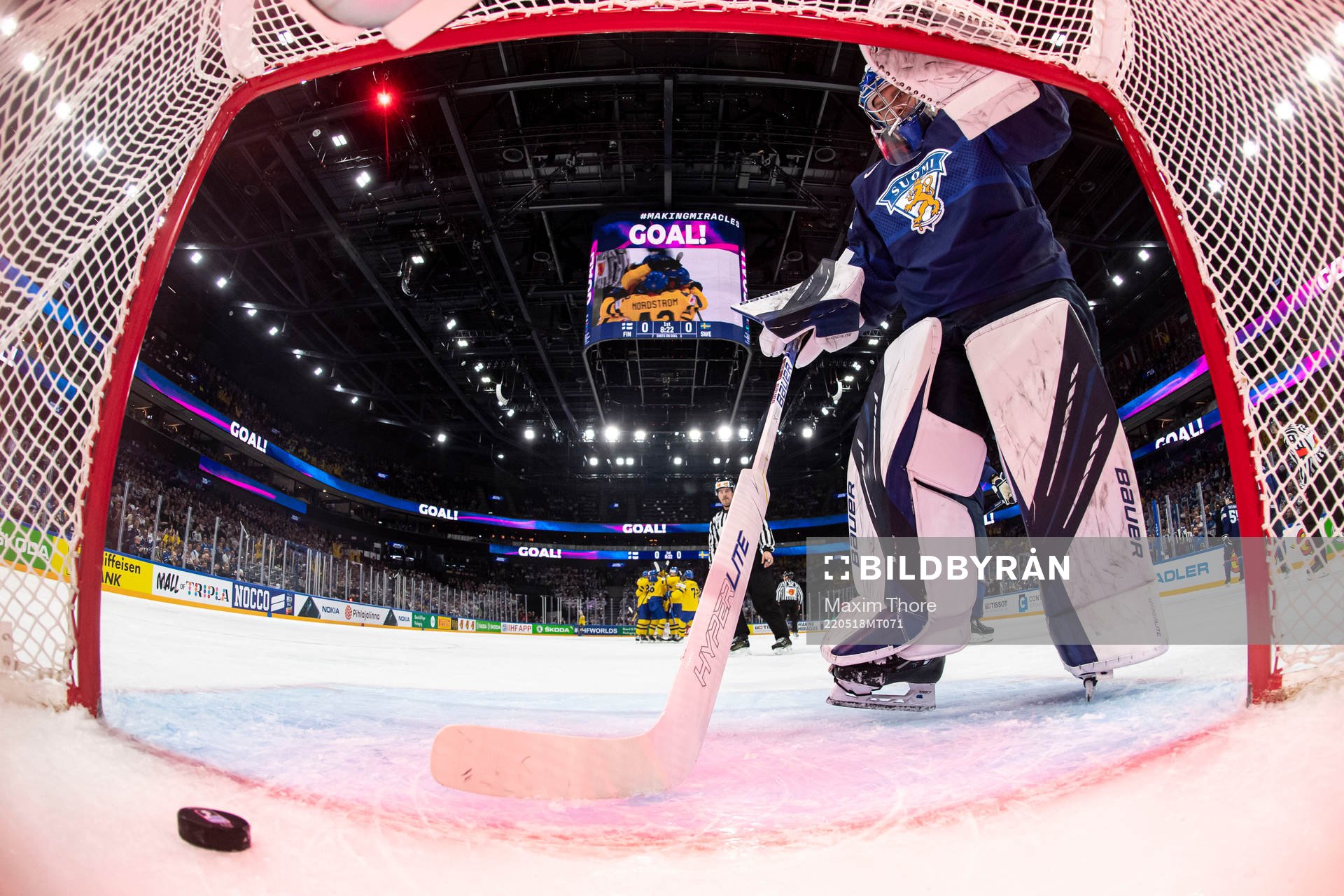 Goaltender harri Säteri of Finland looks dejected