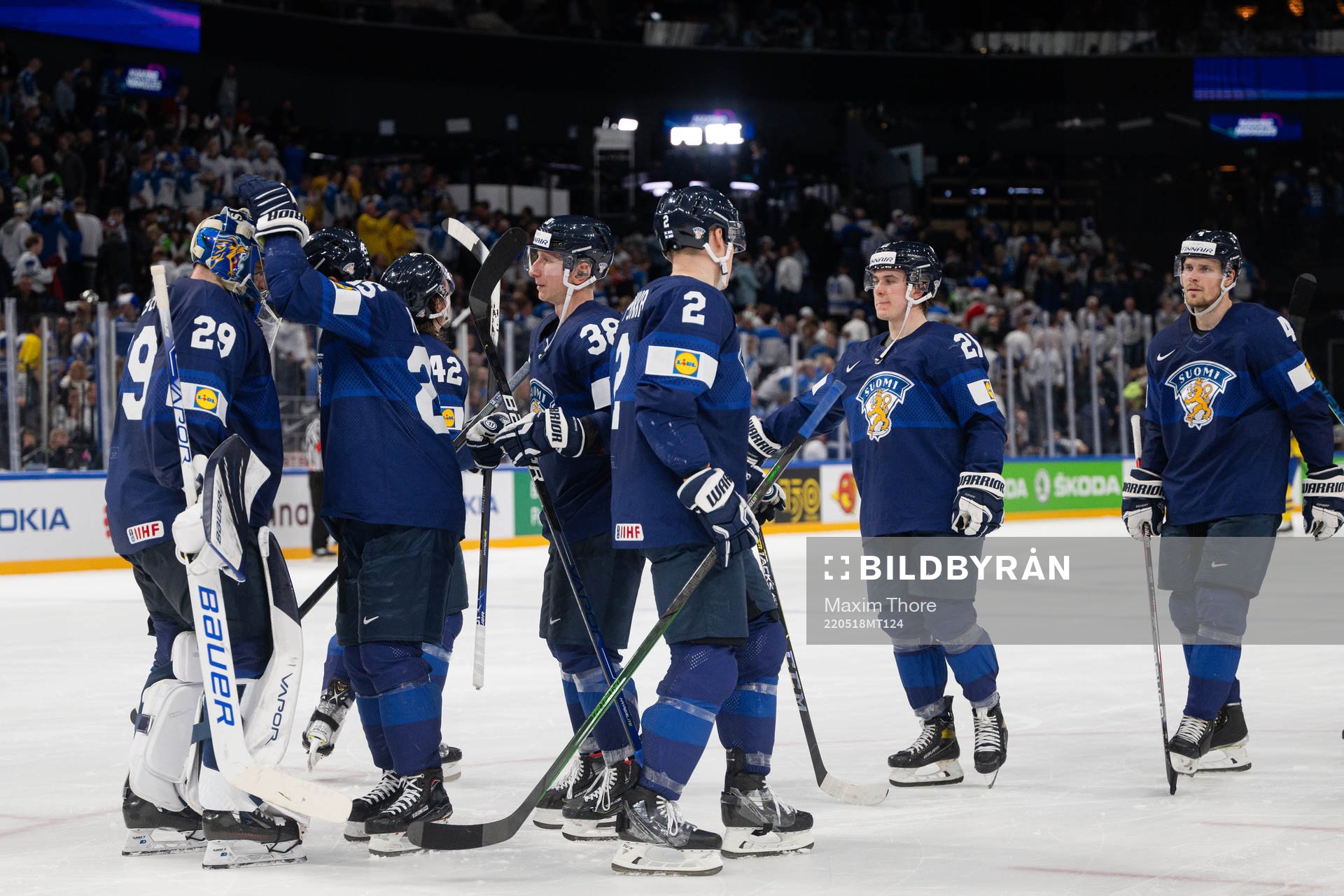 Players of Finland look dejected afterthe 2022 IIHF Ice