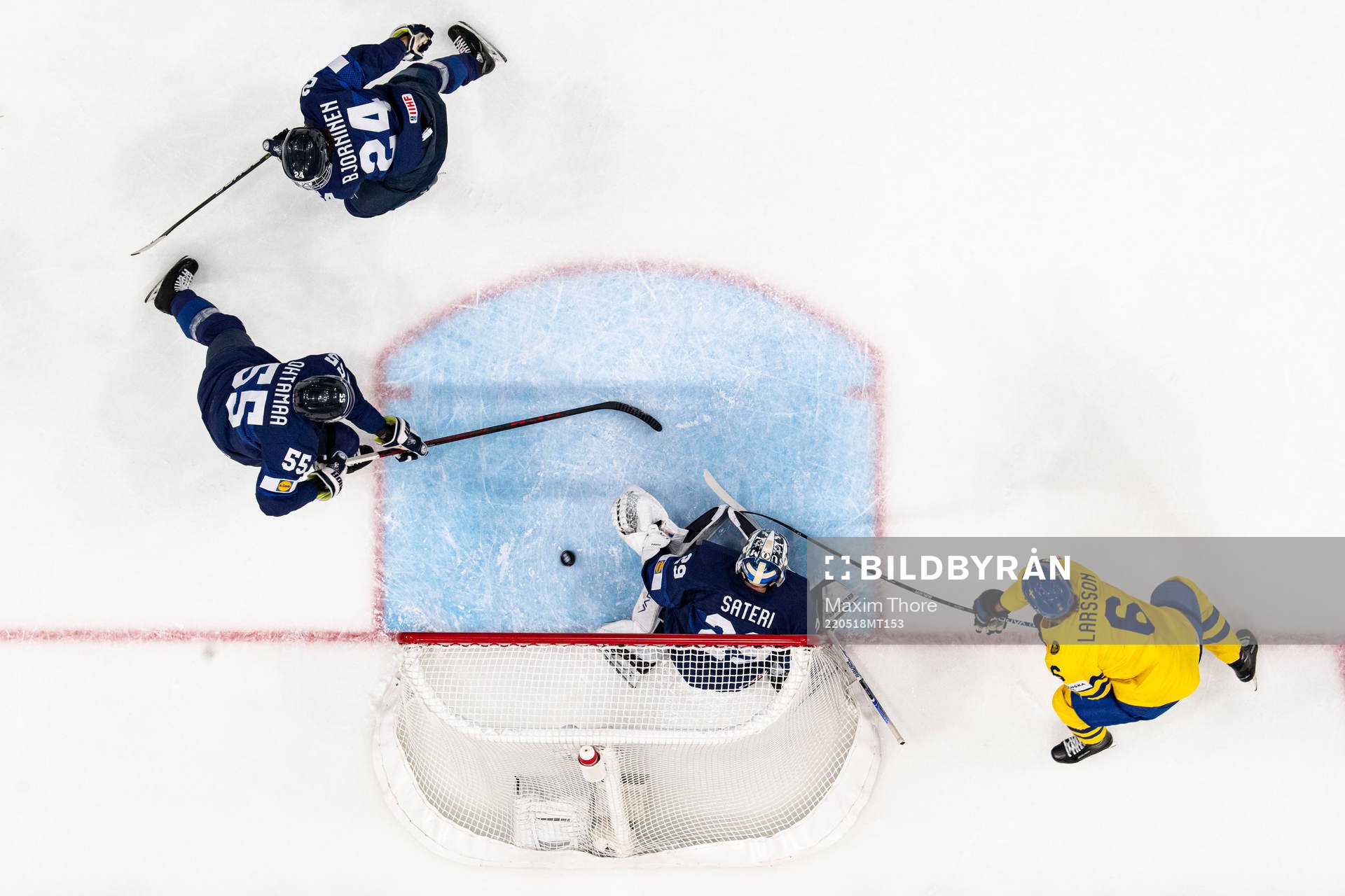 Adam Larsson of Sweden scores the 0-1 goal behind