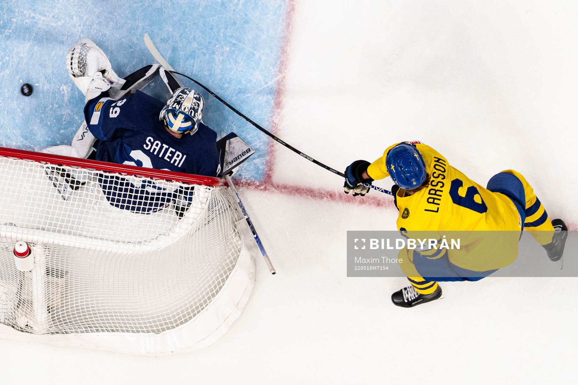 Adam Larsson of Sweden scores the 0-1 goal behind