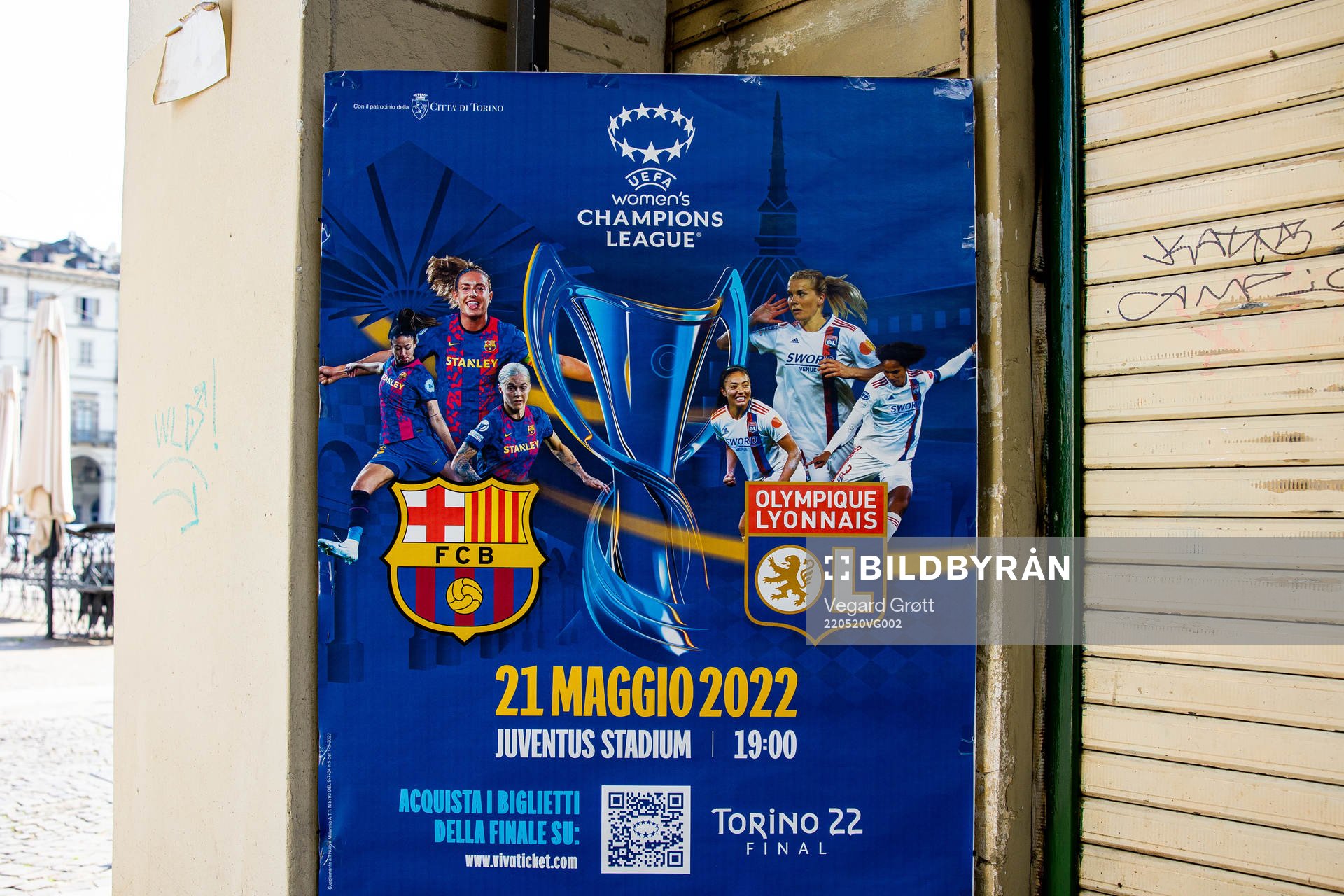 A poster with players of Barcelona and Lyon
