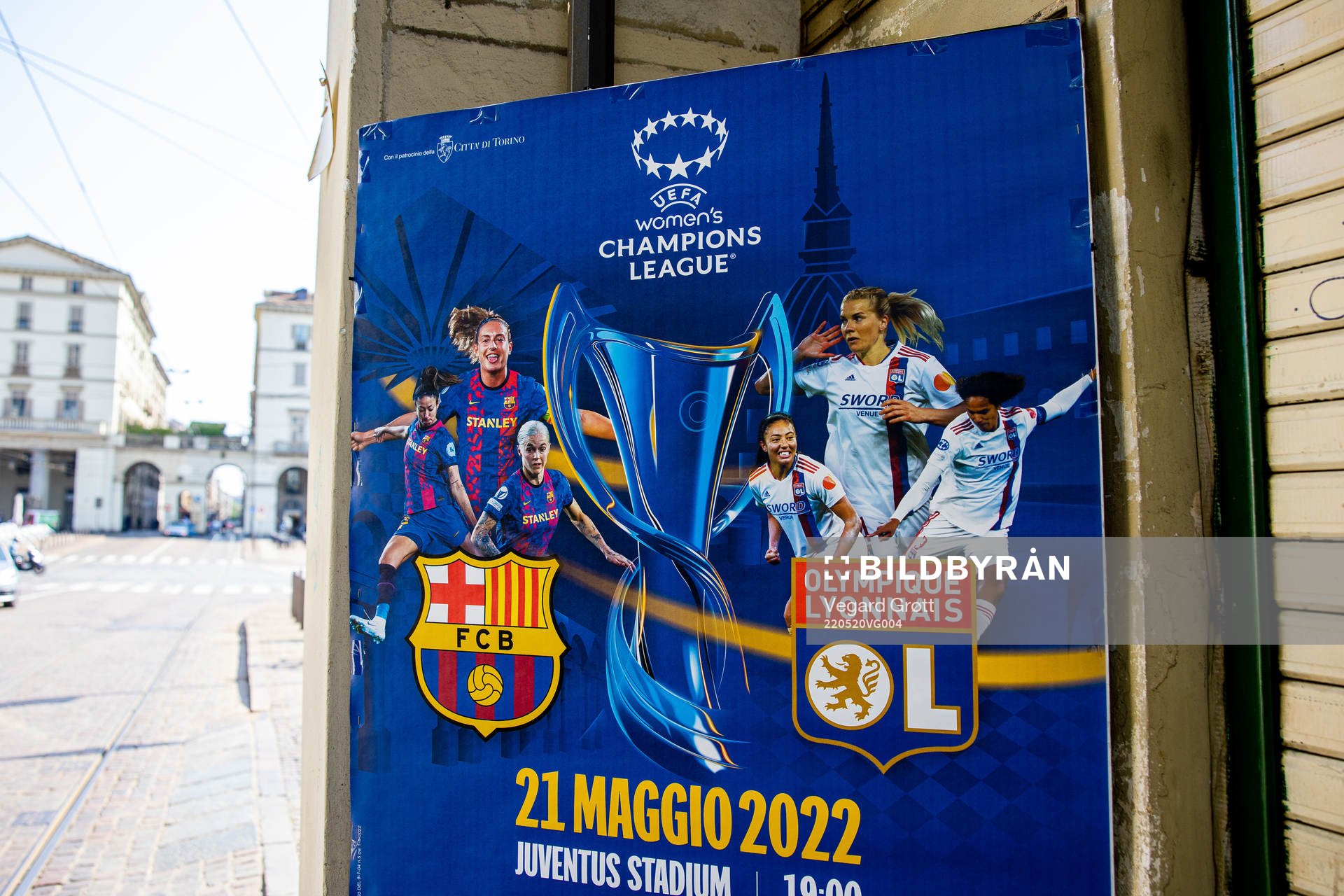 A poster with players of Barcelona and Lyon