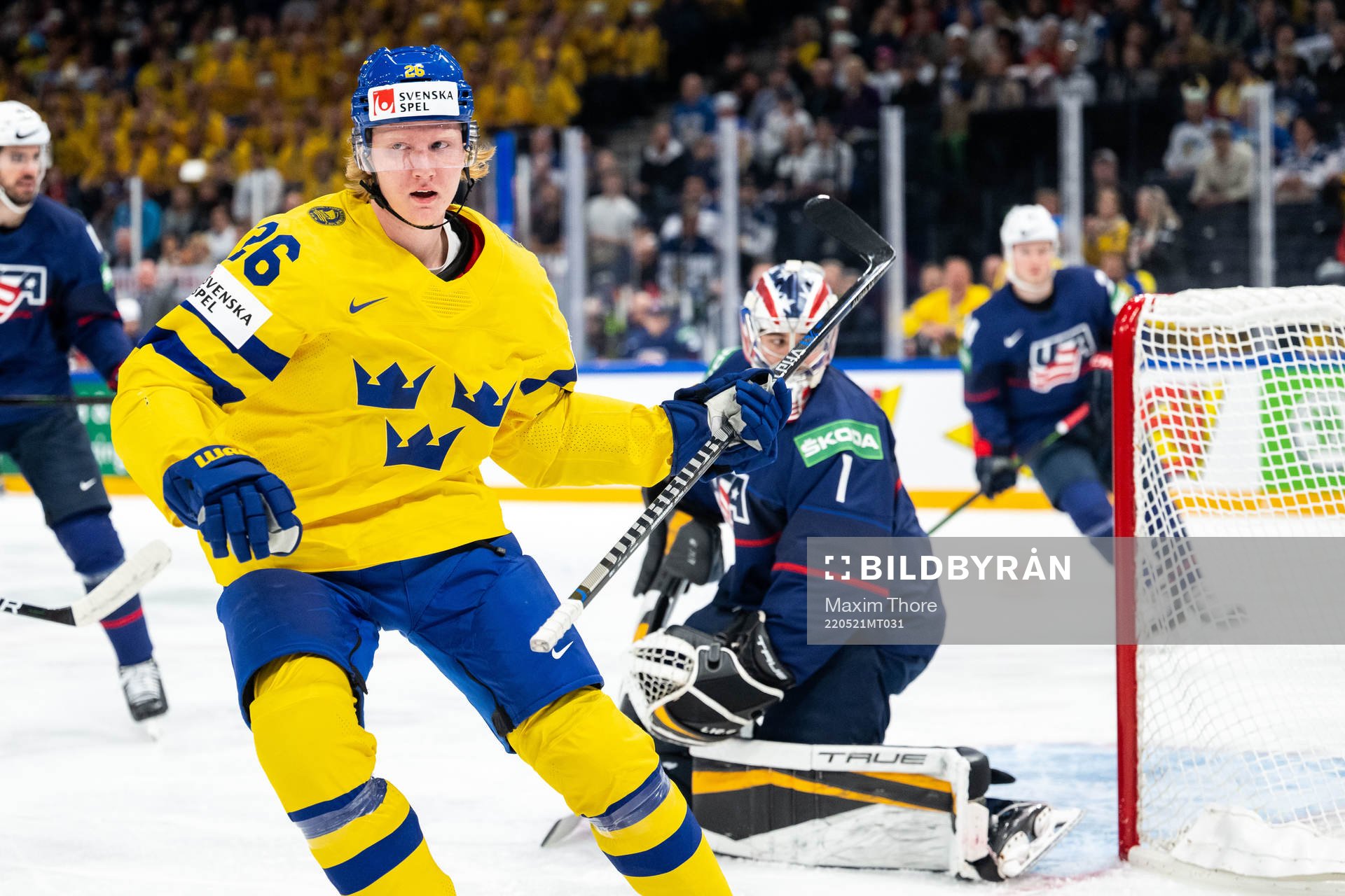 Rasmus Dahlin of Sweden scores 0-1 behind goaltender Jeremy