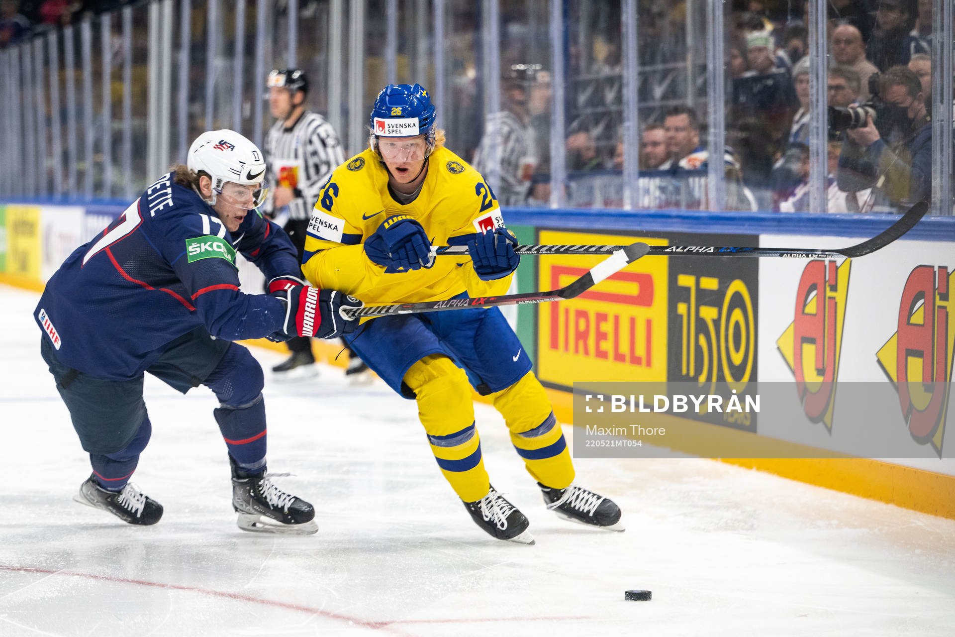 Adam Gaudette of USA and Rasmus Dahlin of Sweden