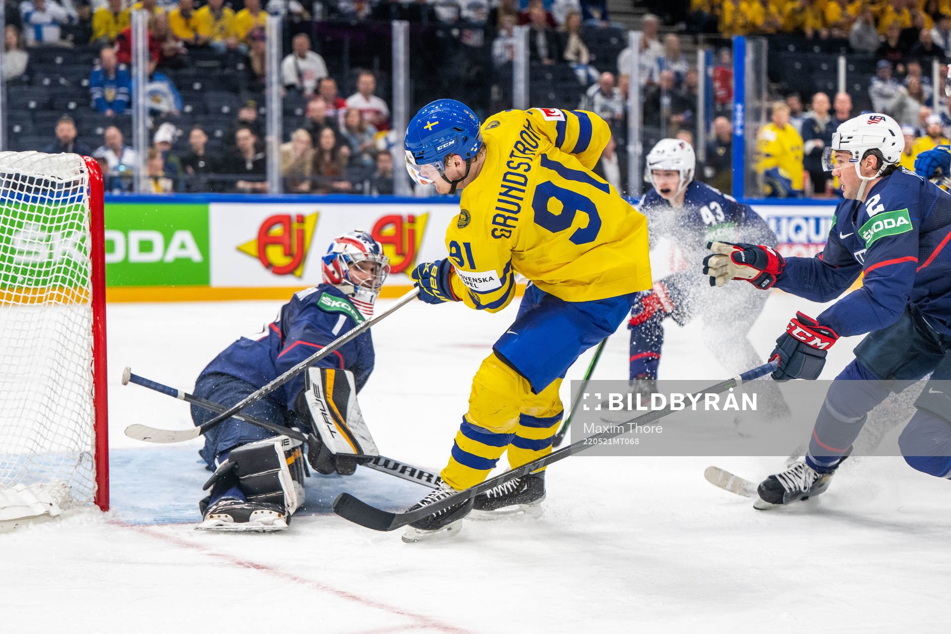 Carl Grundström of Sweden scores 1-2 which later is