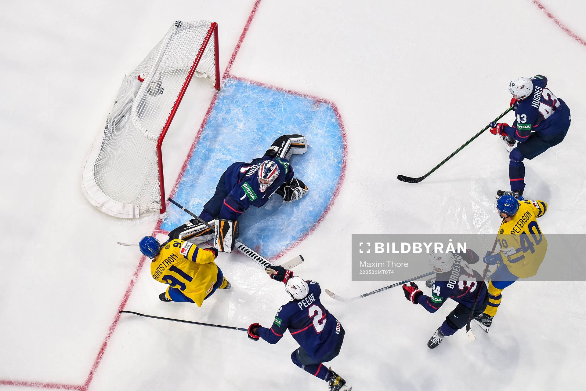 Carl Grundström of Sweden scores 1-2 which later is