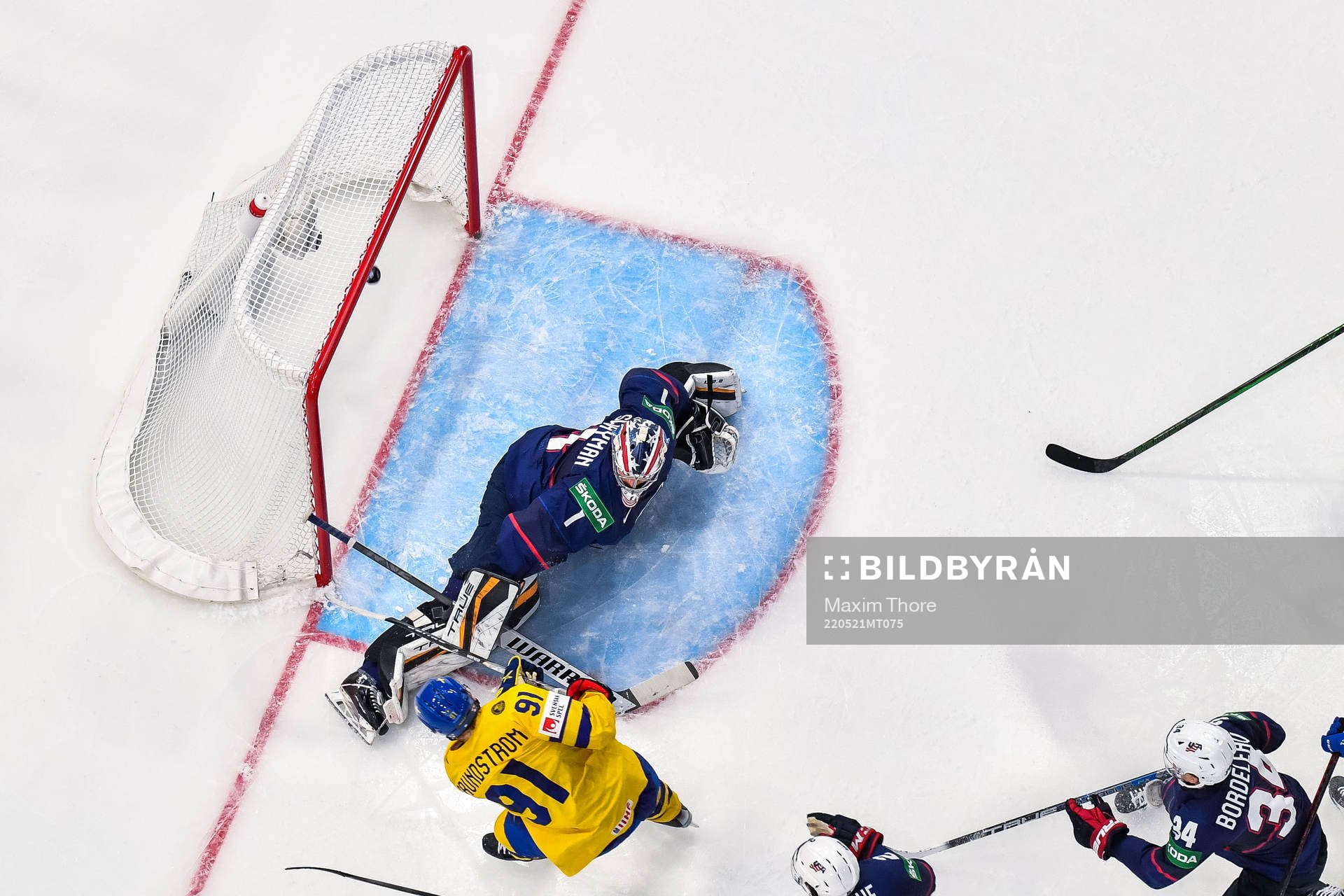 Carl Grundström of Sweden scores 1-2 which later is