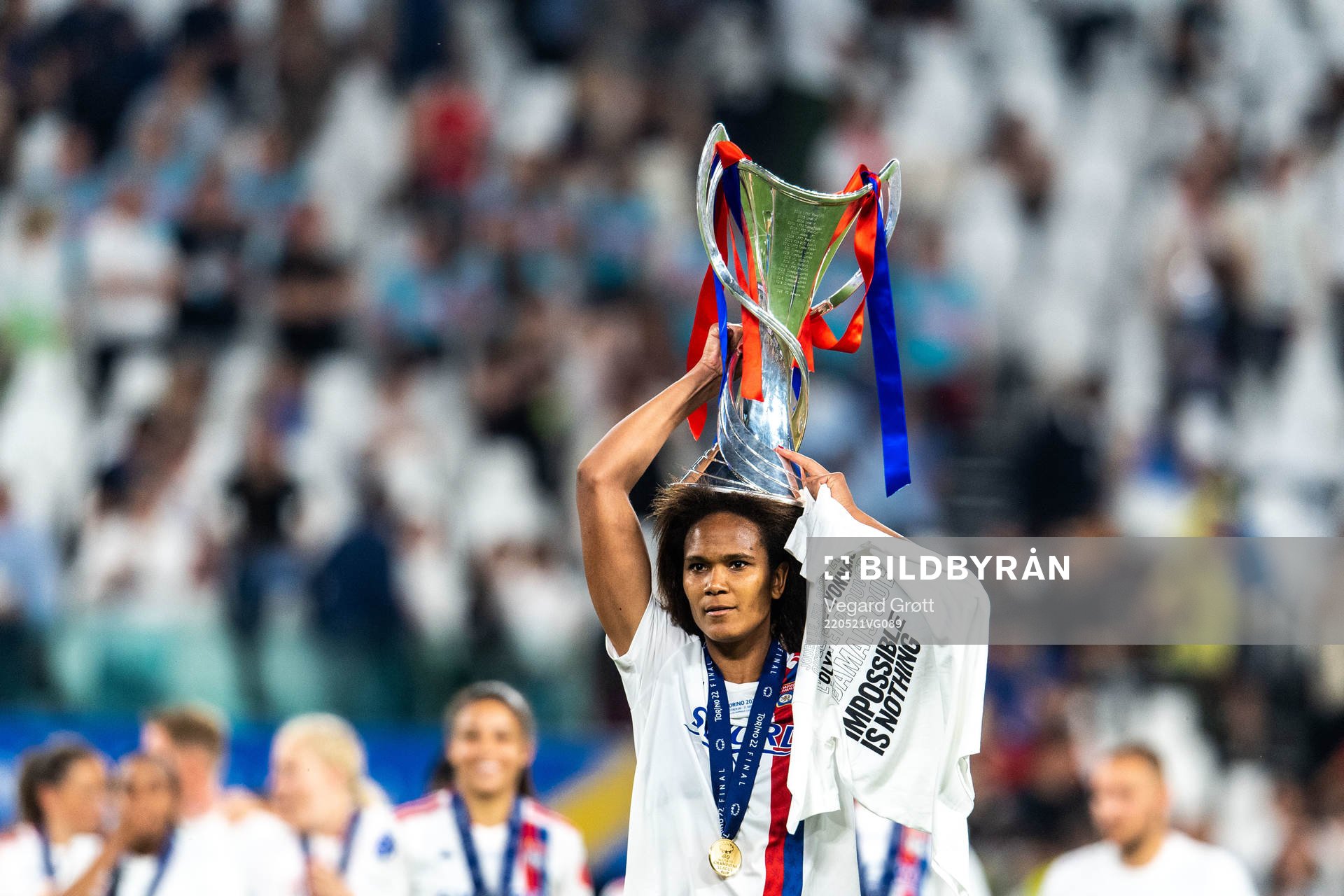 Wendie Renard of Lyon celebrates winning the UEFA Women's