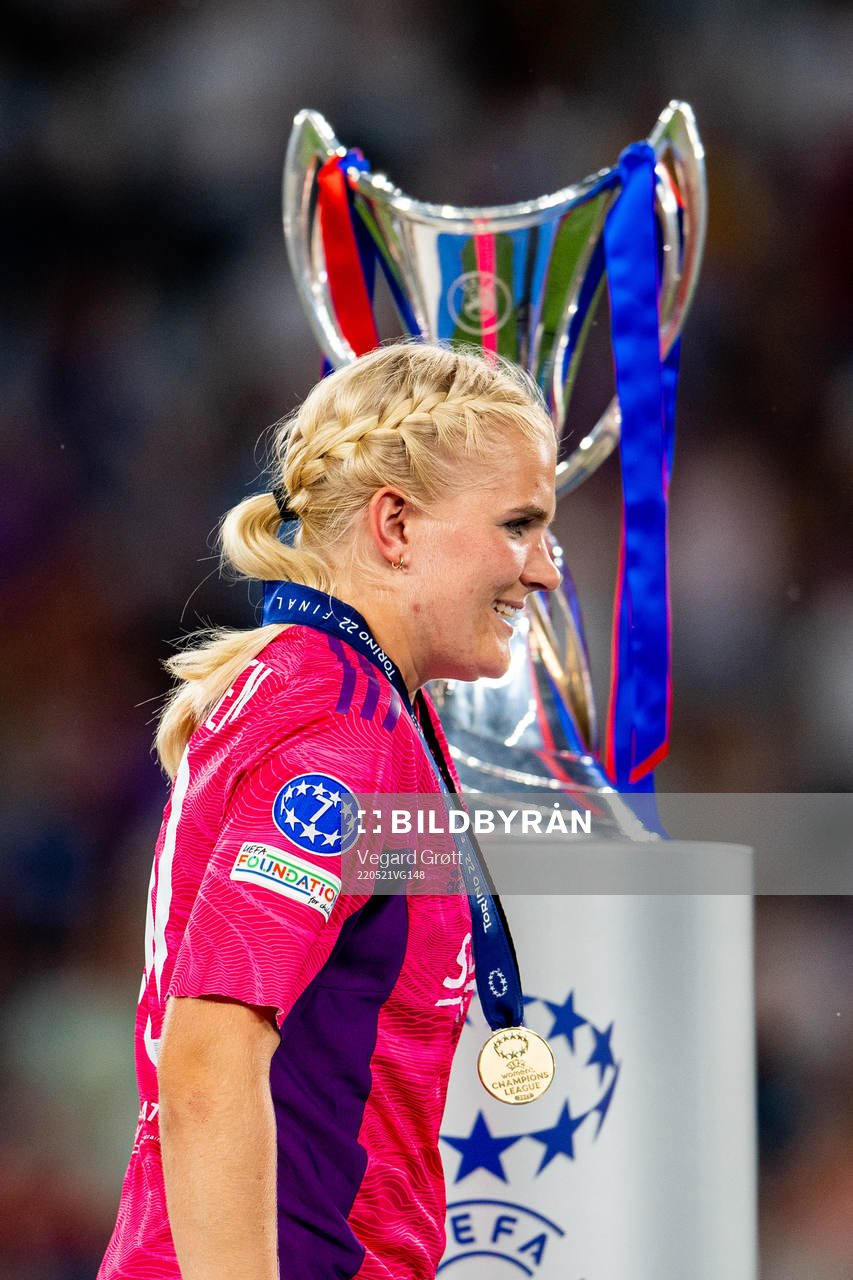 Goalkeeper Emma Holmgren of Lyon walks past the winners trophy after winning the UEFA Women's Champions League final match between Barcelona and Lyon on May 21, 2022 in Turin.