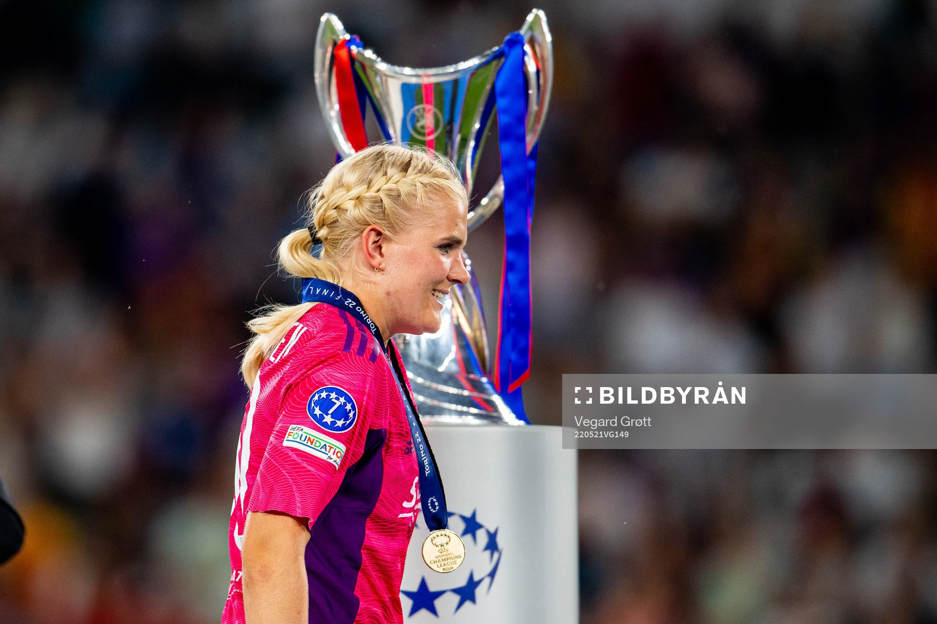 Goalkeeper Emma Holmgren of Lyon walks past the winners trophy after winning the UEFA Women's Champions League final match between Barcelona and Lyon on May 21, 2022 in Turin.