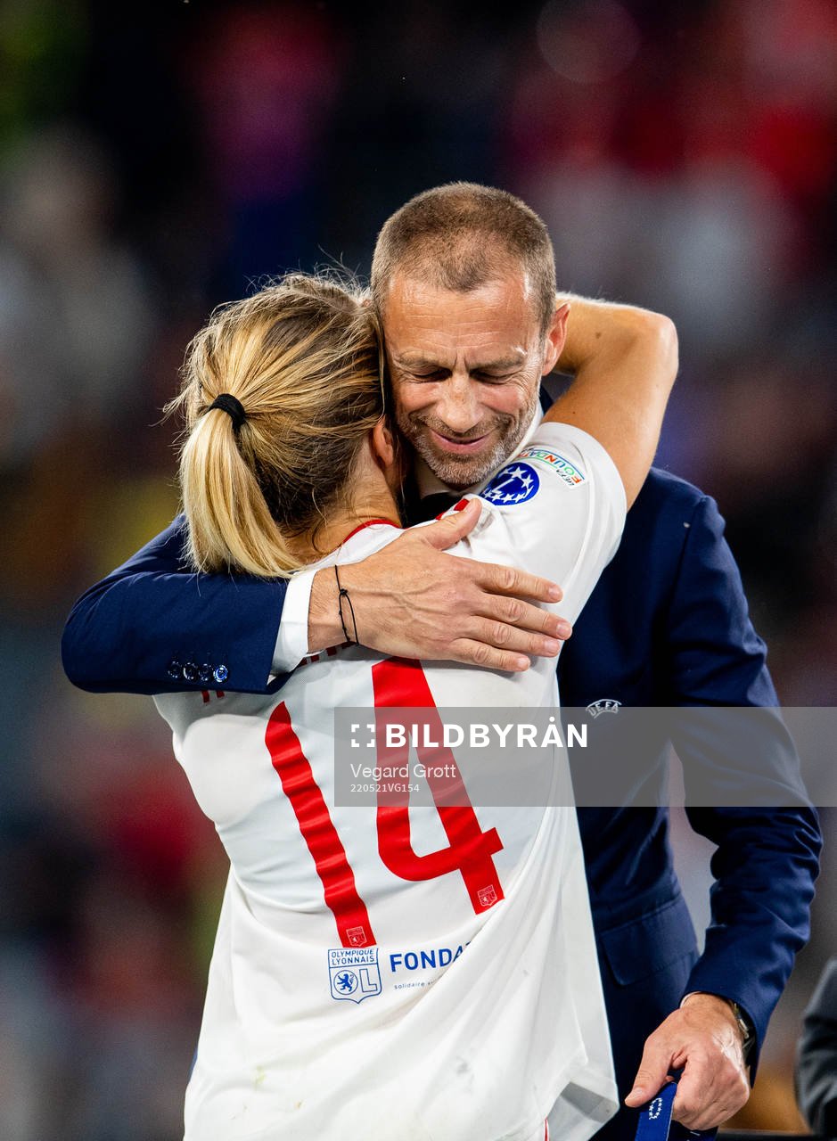 Ada Hegerberg of Lyon receives her winners medal by UEFA president Aleksander Ceferin after the UEFA Women's Champions League final match between Barcelona and Lyon on May 21, 2022 in Turin.