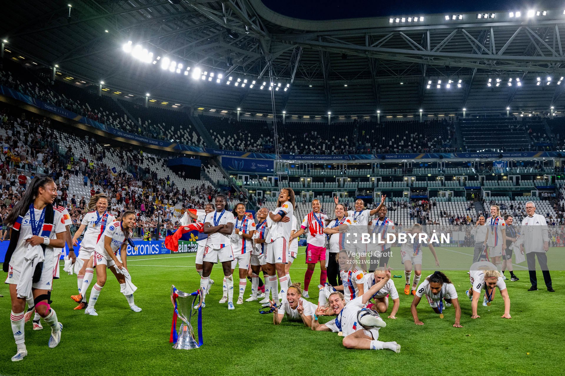 Melvine Malard, Griedge Mbock Bathy, Wendie Renard, goalkeeper Sarah Bouhaddi, Ada Hegerberg and players of Lyon celebrate with the winners trophy after the UEFA Women's Champions League final match between Barcelona and Lyon on May 21, 2022 in Turin. 