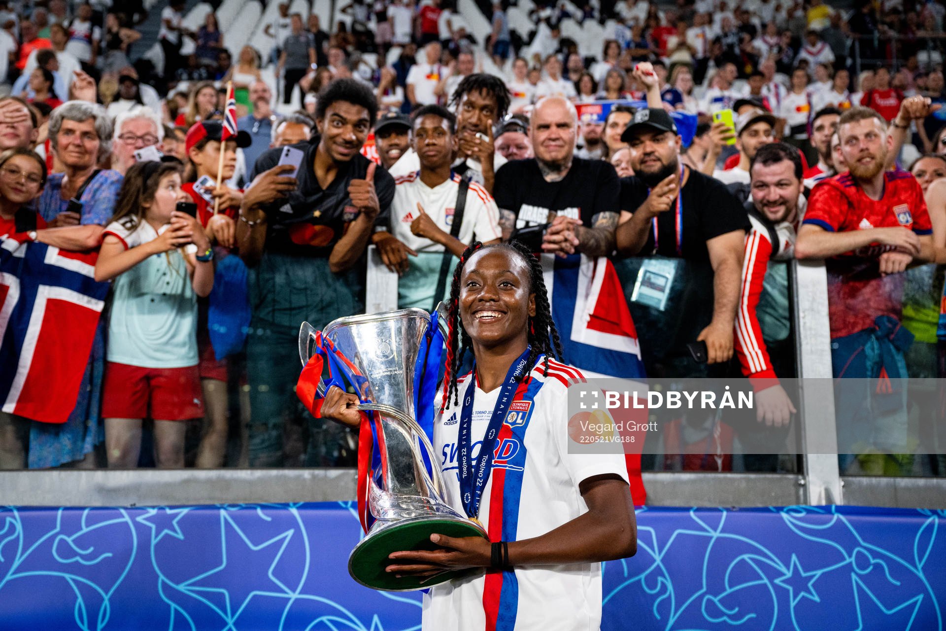 Melvine Malard of Lyon celebrates with the winners trophy