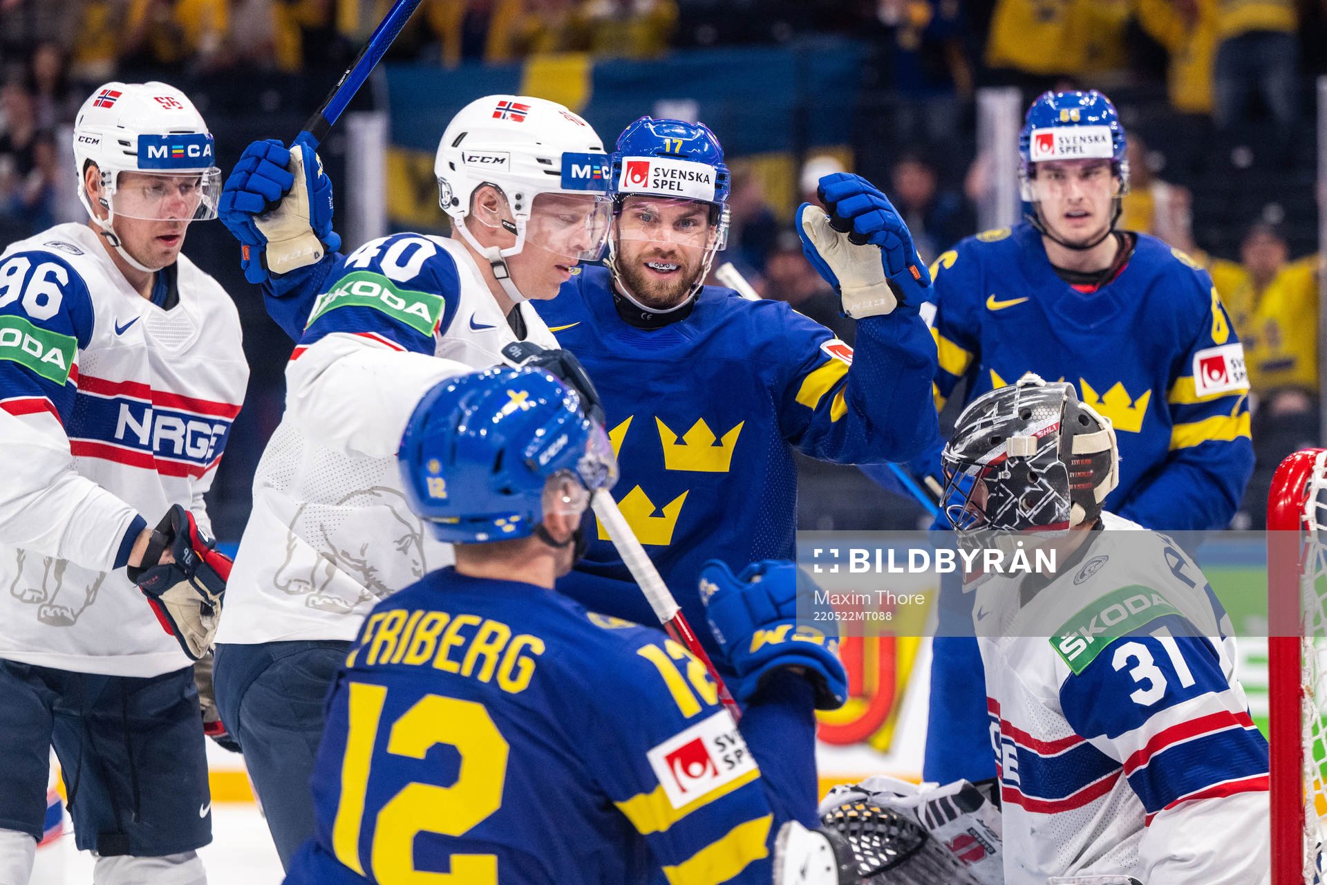 Oskar Lang and Max Friberg of Sweden celebrate 6-1