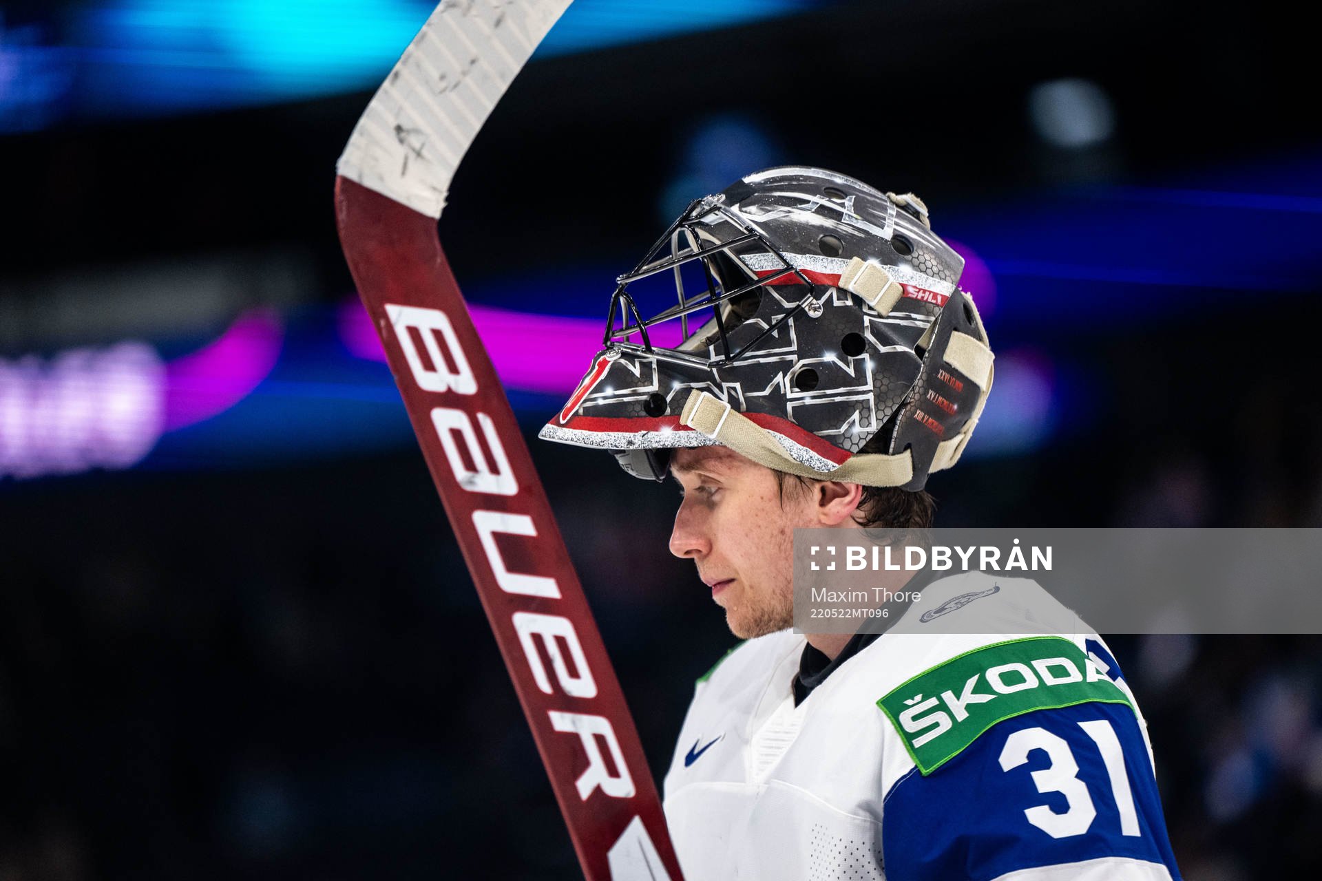 Goaltender Jonas Arntzen of Norway looks dejected