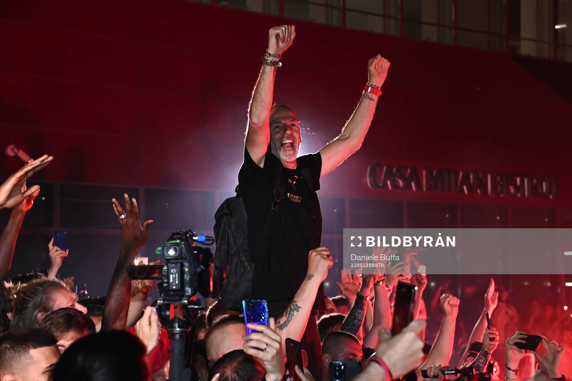 Pioli of AC Milan celebrates with fans