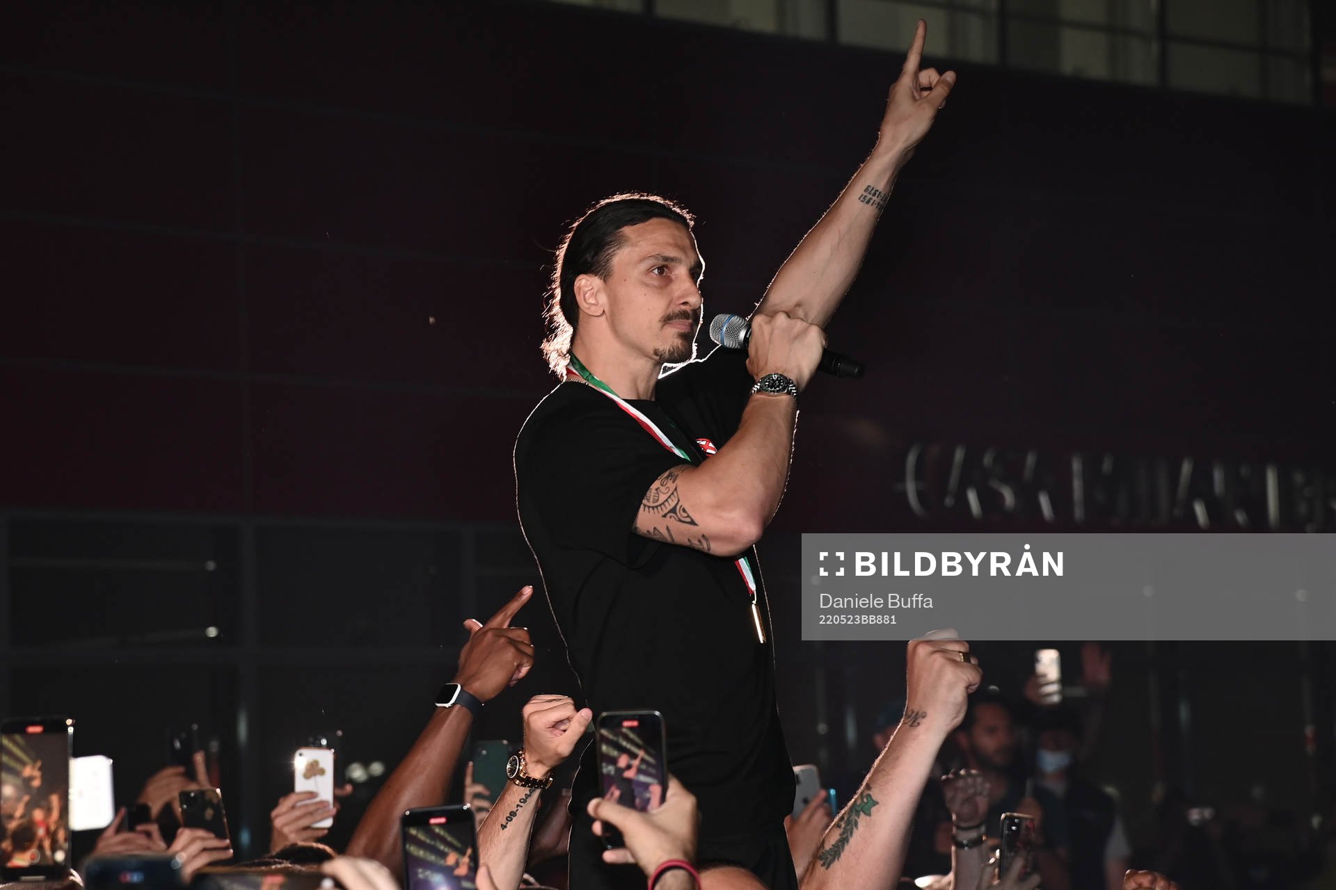 Zlatan Ibrahimovic of AC Milan celebrates with fans