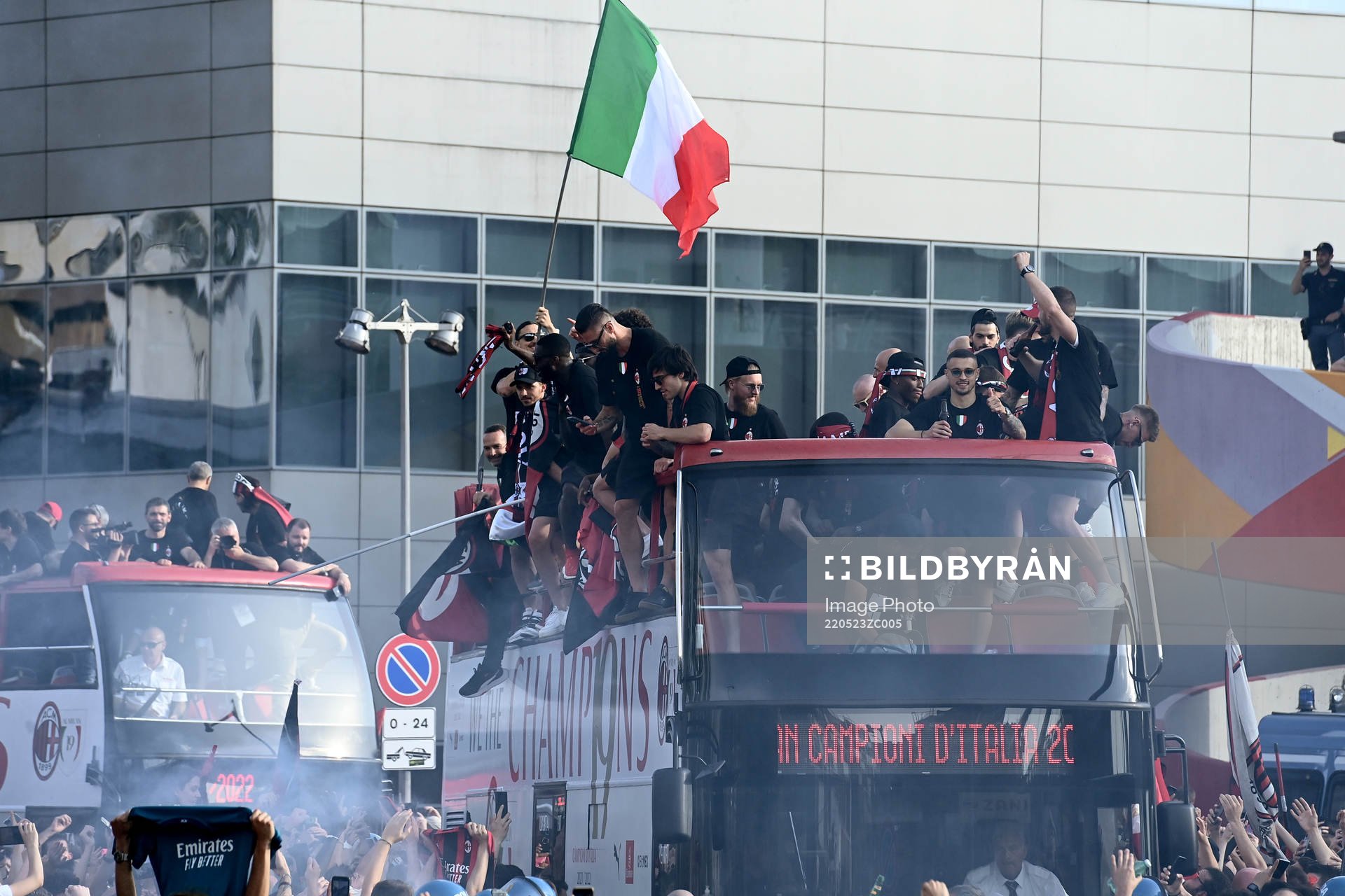 Players of Milan celebrate