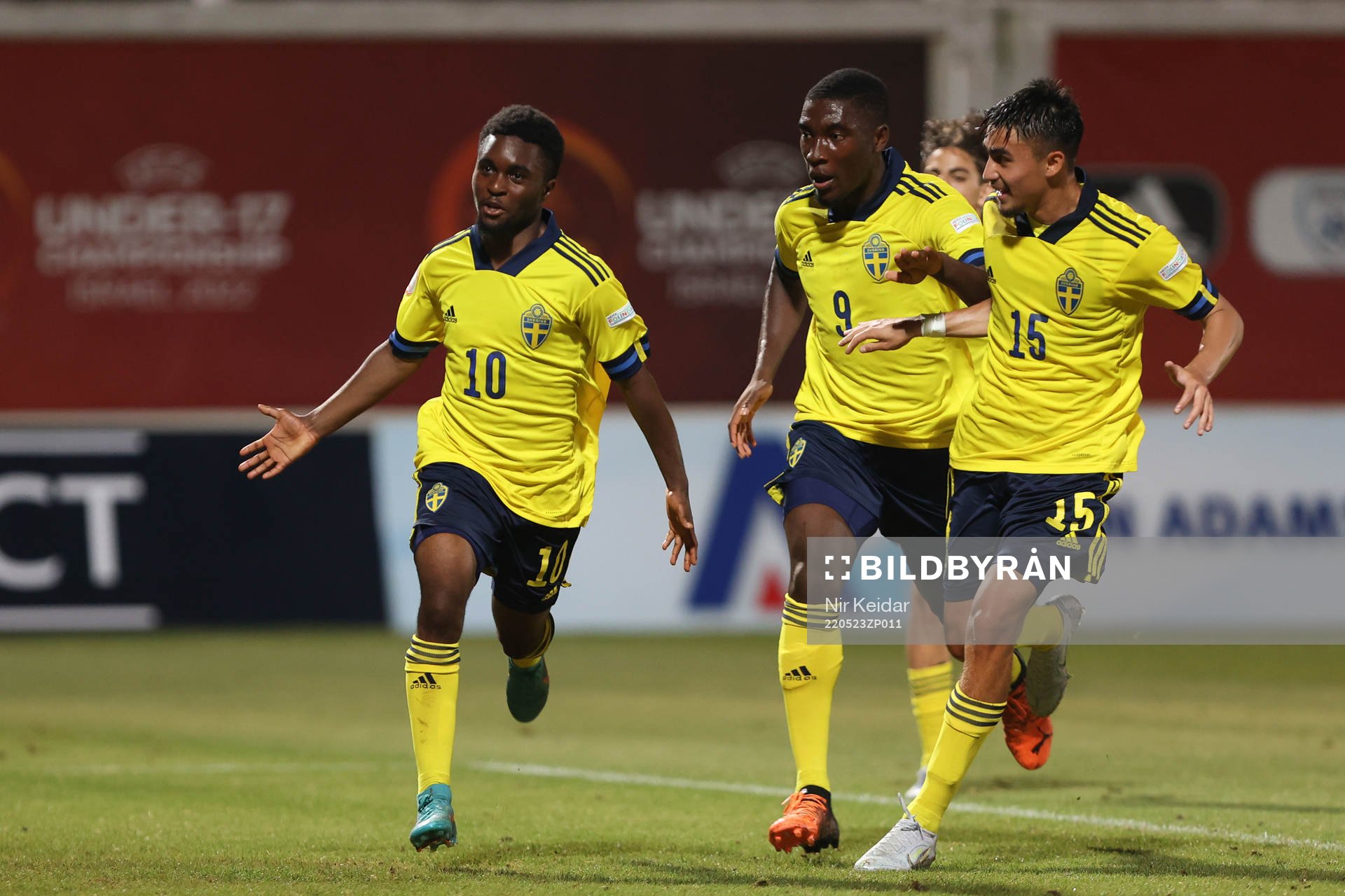 Jardell Kanga of Sweden celebrates with Emmanuel Tannor and