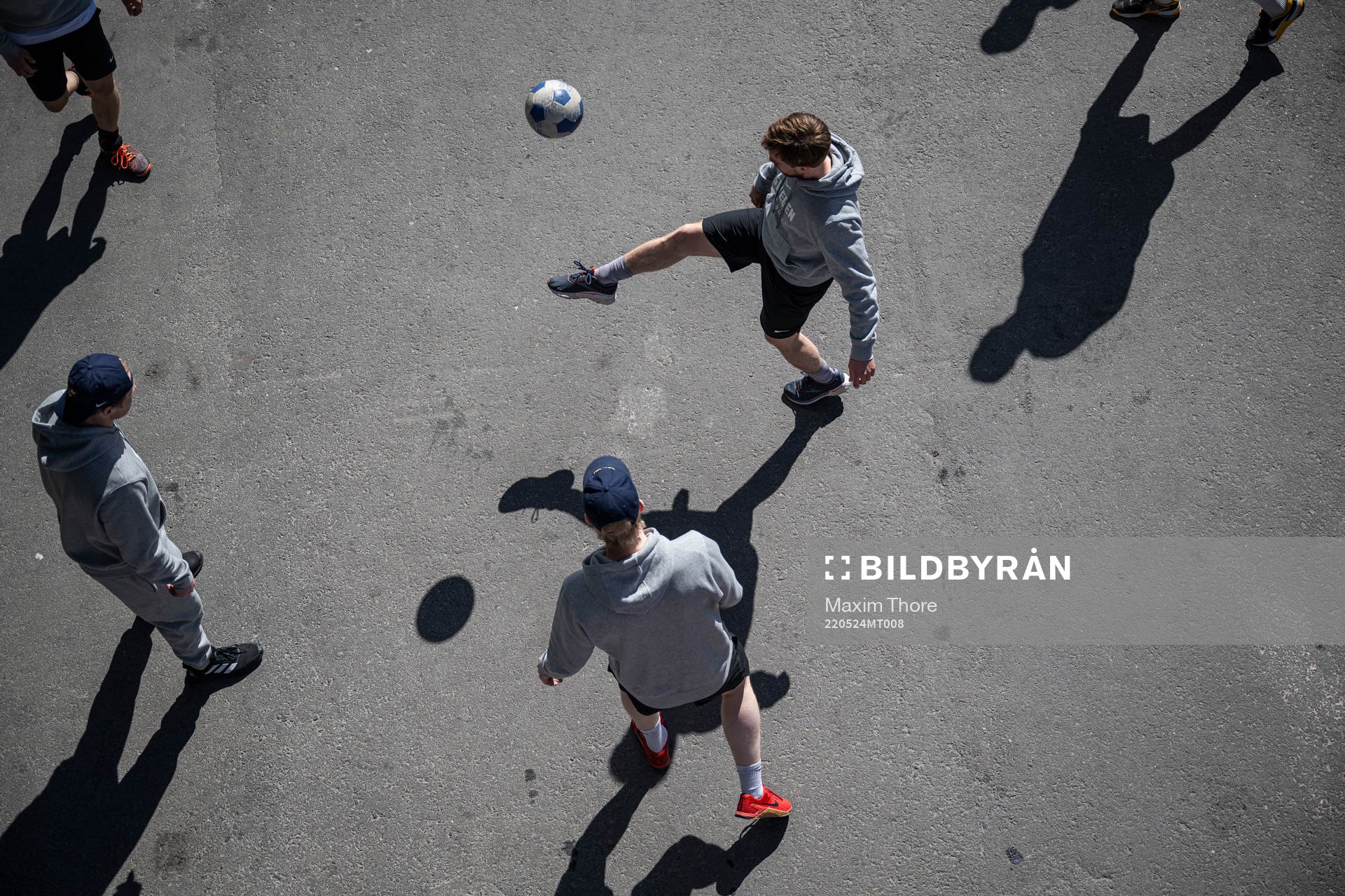 Oskar Lang of Sweden play football with teammates