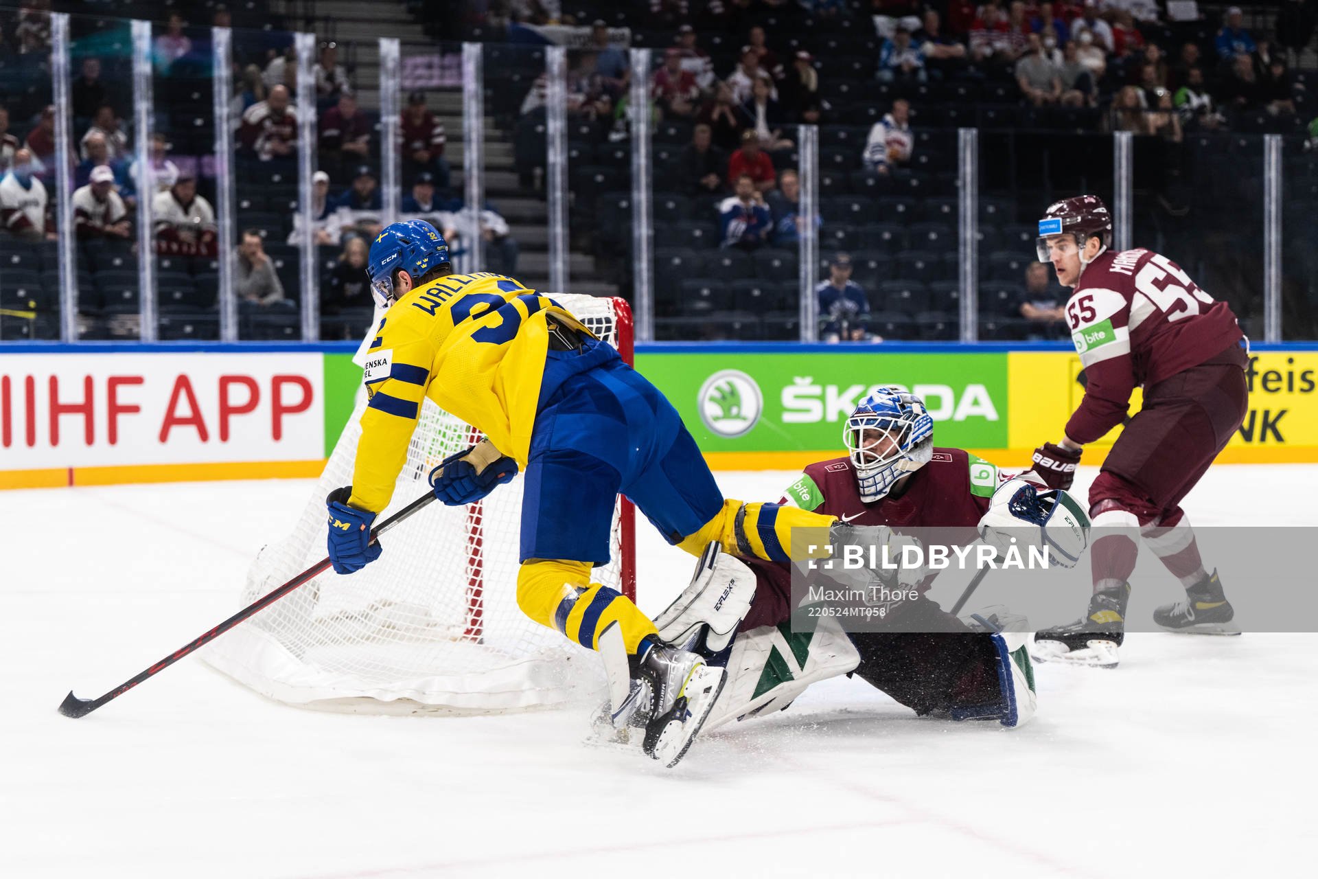 Lucas Wallmark of Sweden and goaltender Arturs Silovs of