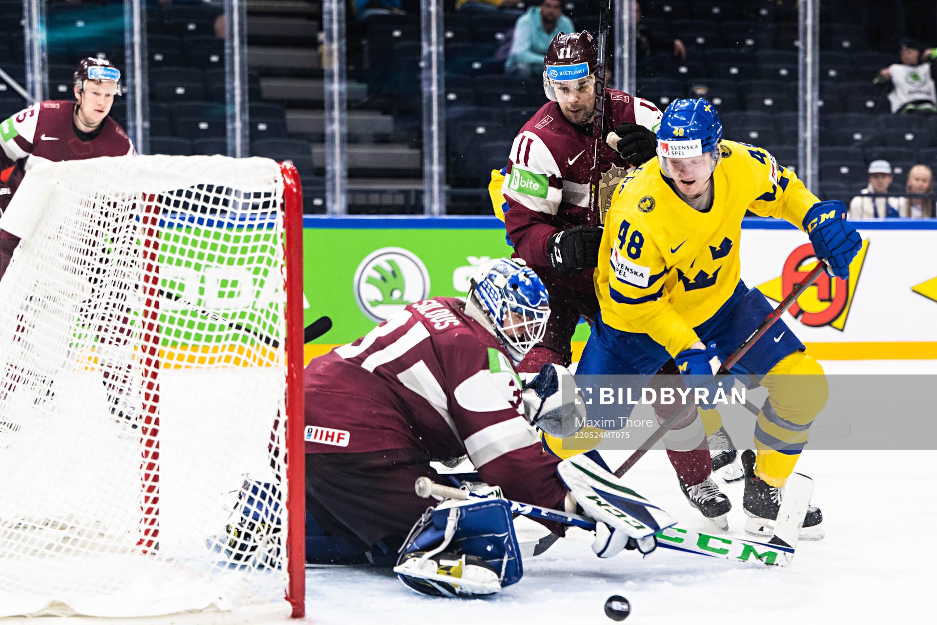 of Latvia goaltender Arturs Silovs and Kristaps Sotnieks