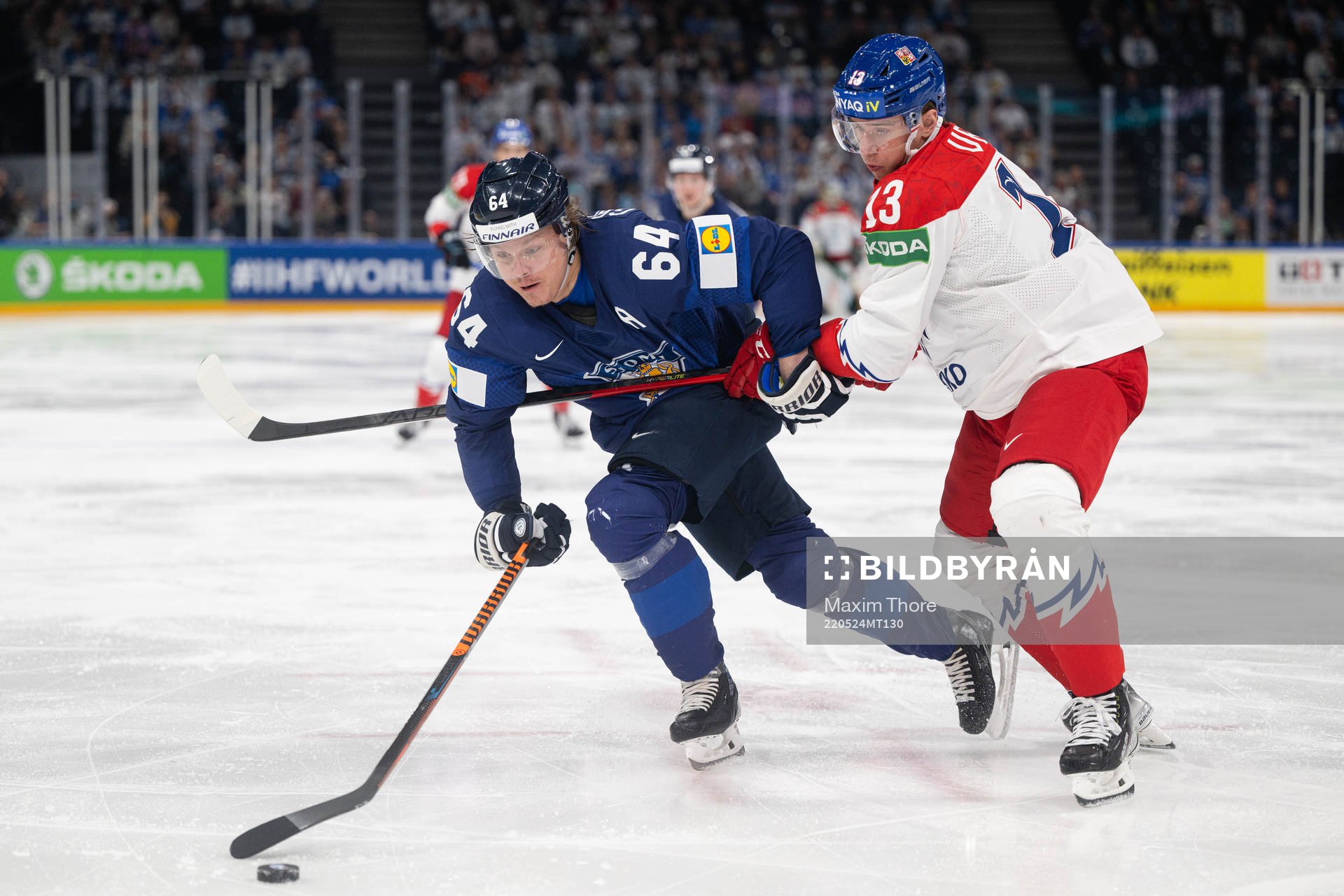 Mikael Granlund of Finland and Jakub Vrana of Czech Republic