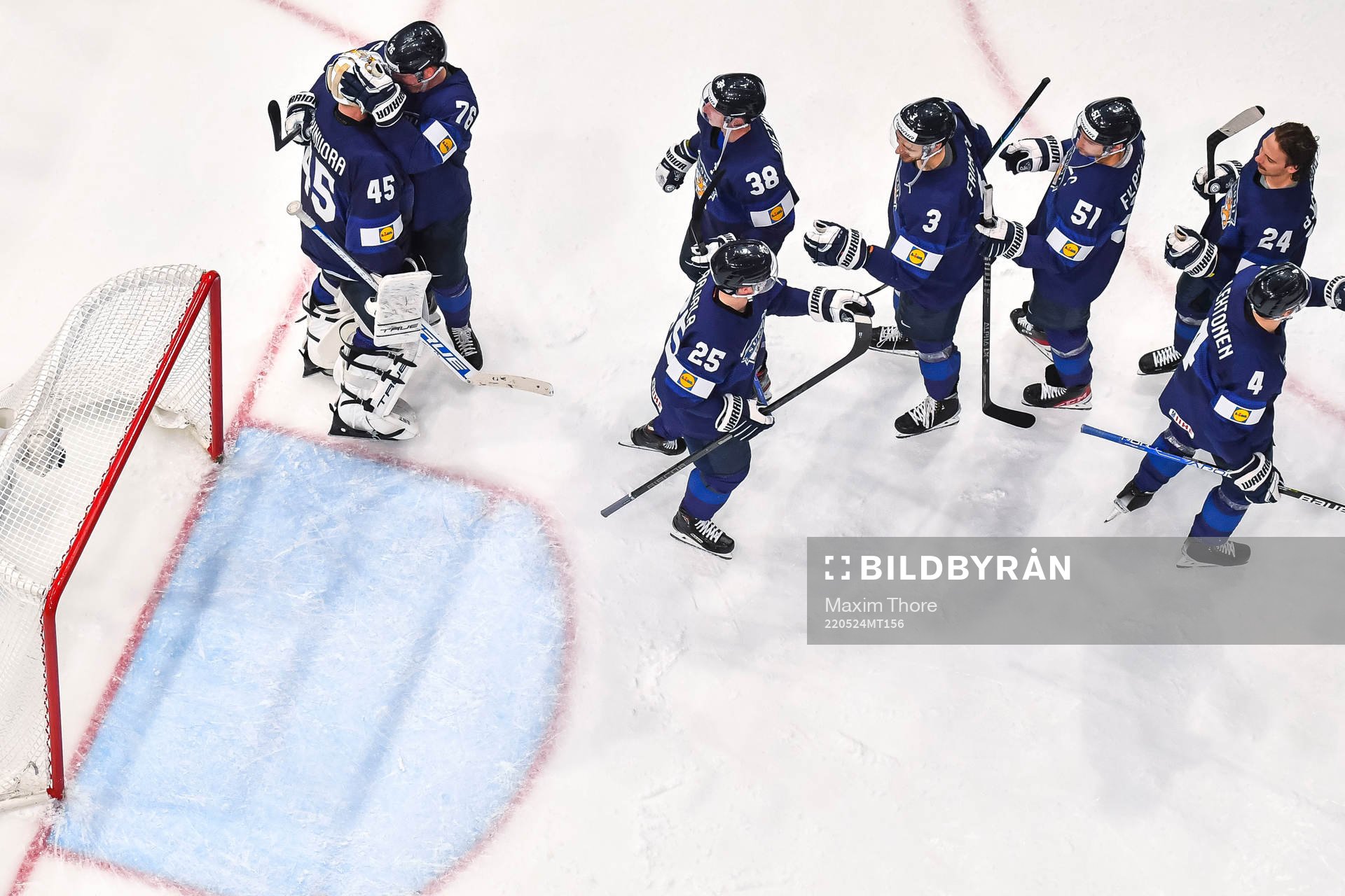 Goaltender Juho Olkinuora of Finland celebrate wit Jere