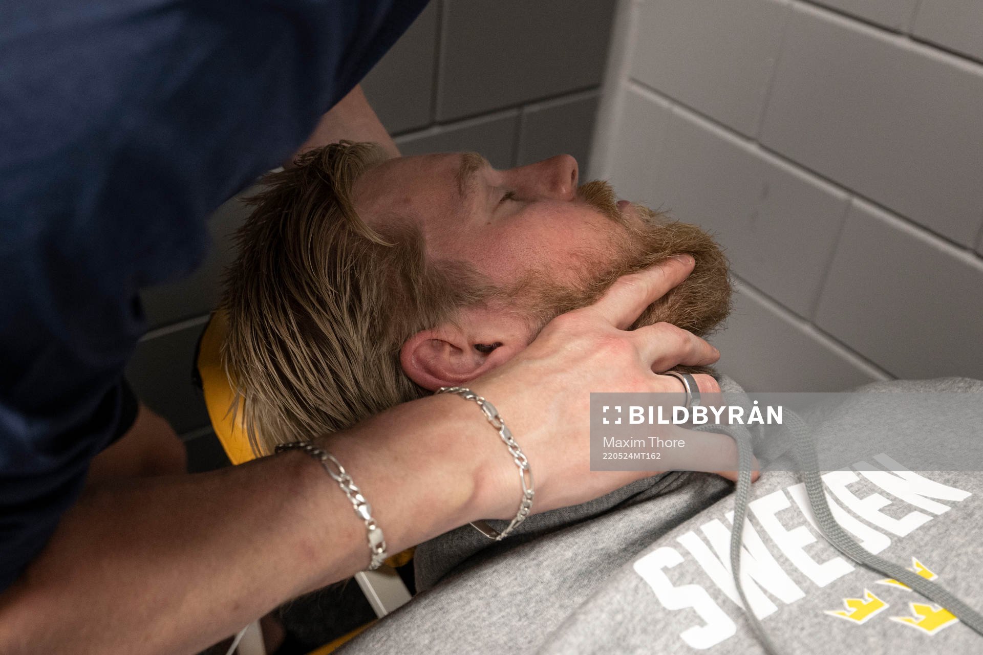Goaltender Magnus Hellberg of Sweden gets a massage