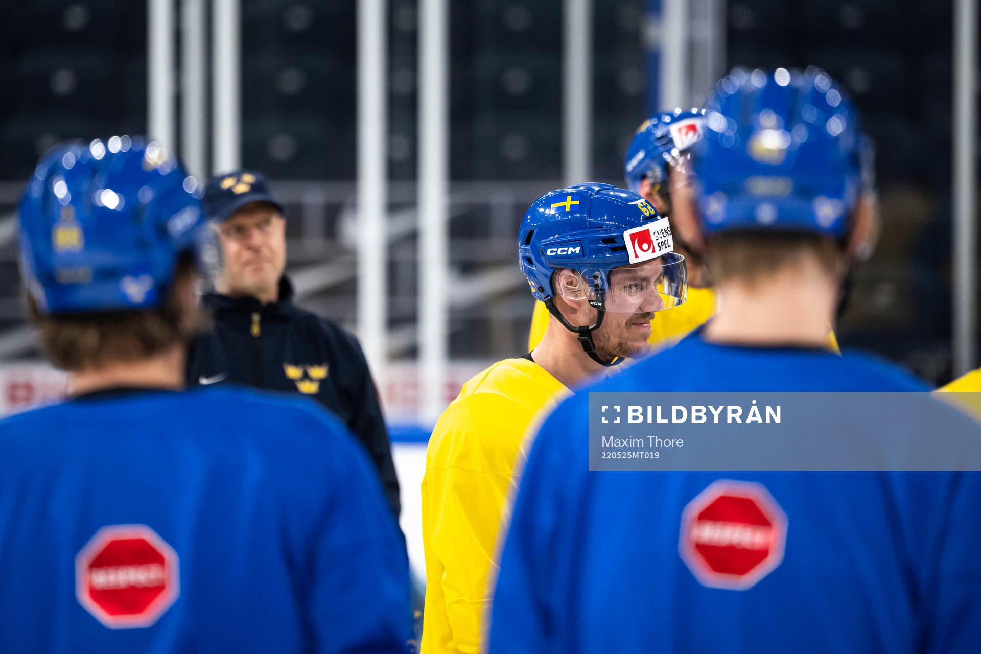 Joel Kellman of Sweden with teammates at a practice session