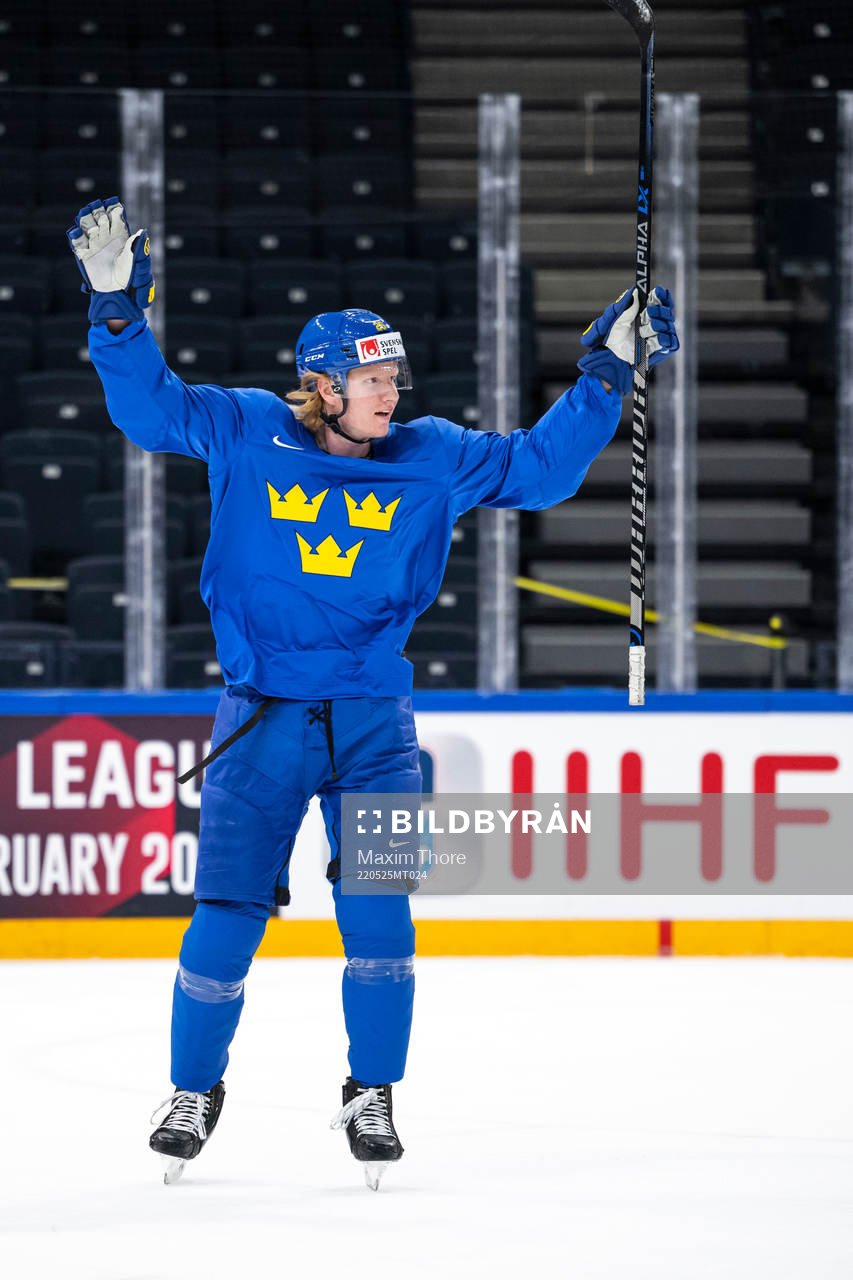 Rasmus Dahlin of Sweden celebrates at a practice session