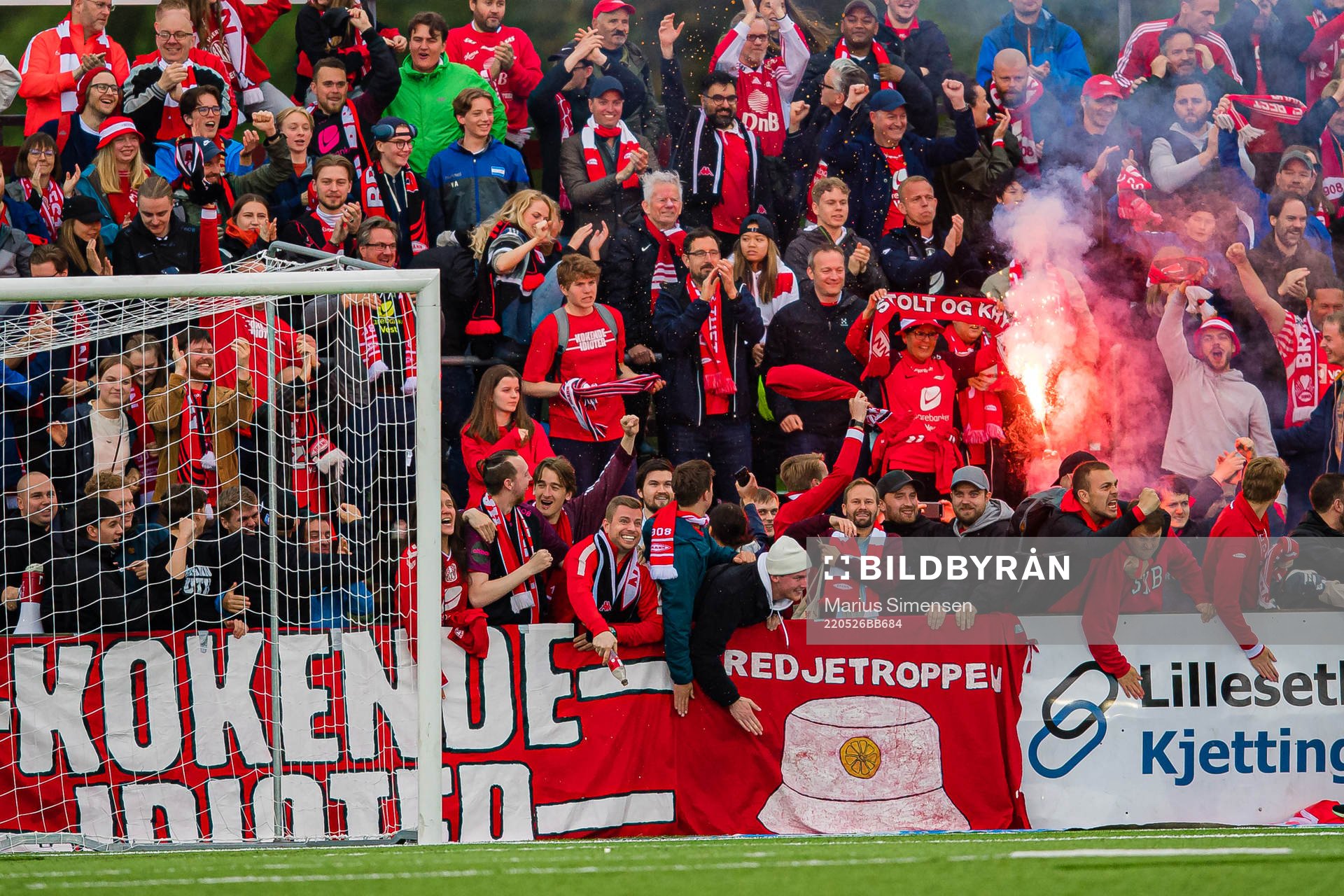 Spectators in the stands celebrates