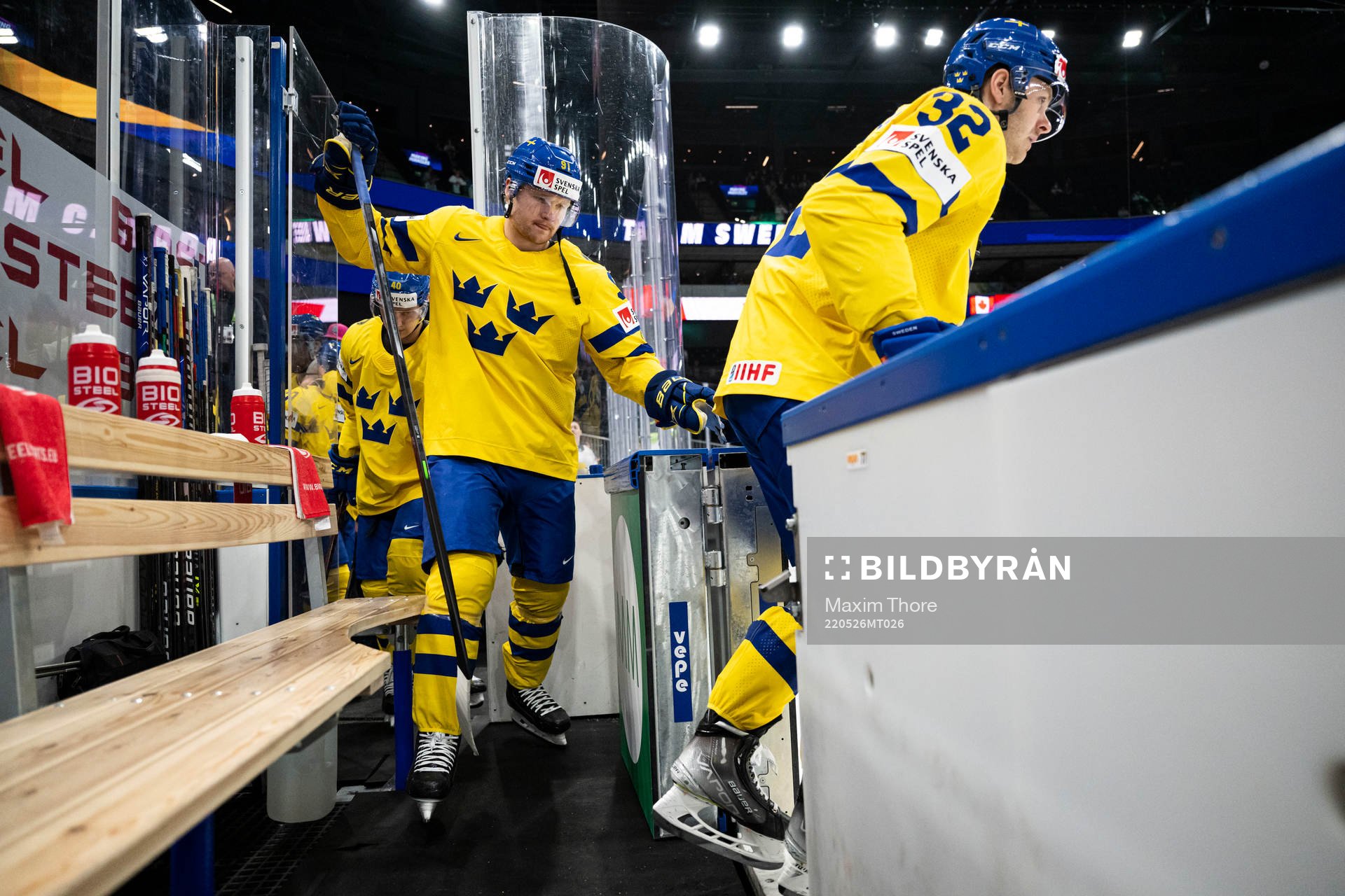 Carl Grundström and Lucas Wallmark of Sweden enter the ice