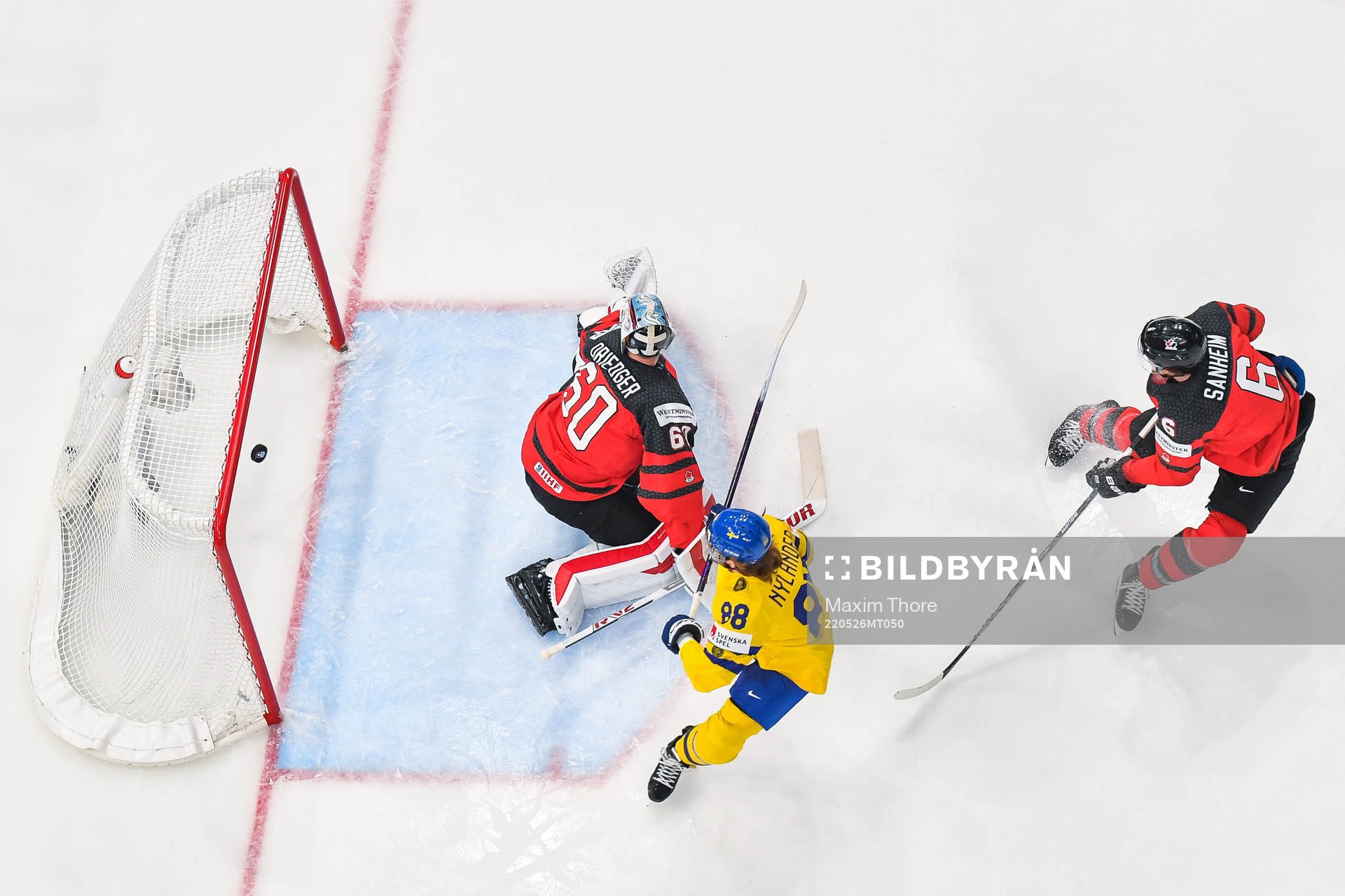 William Nylander of Sweden scores 2-0 behind goaltender