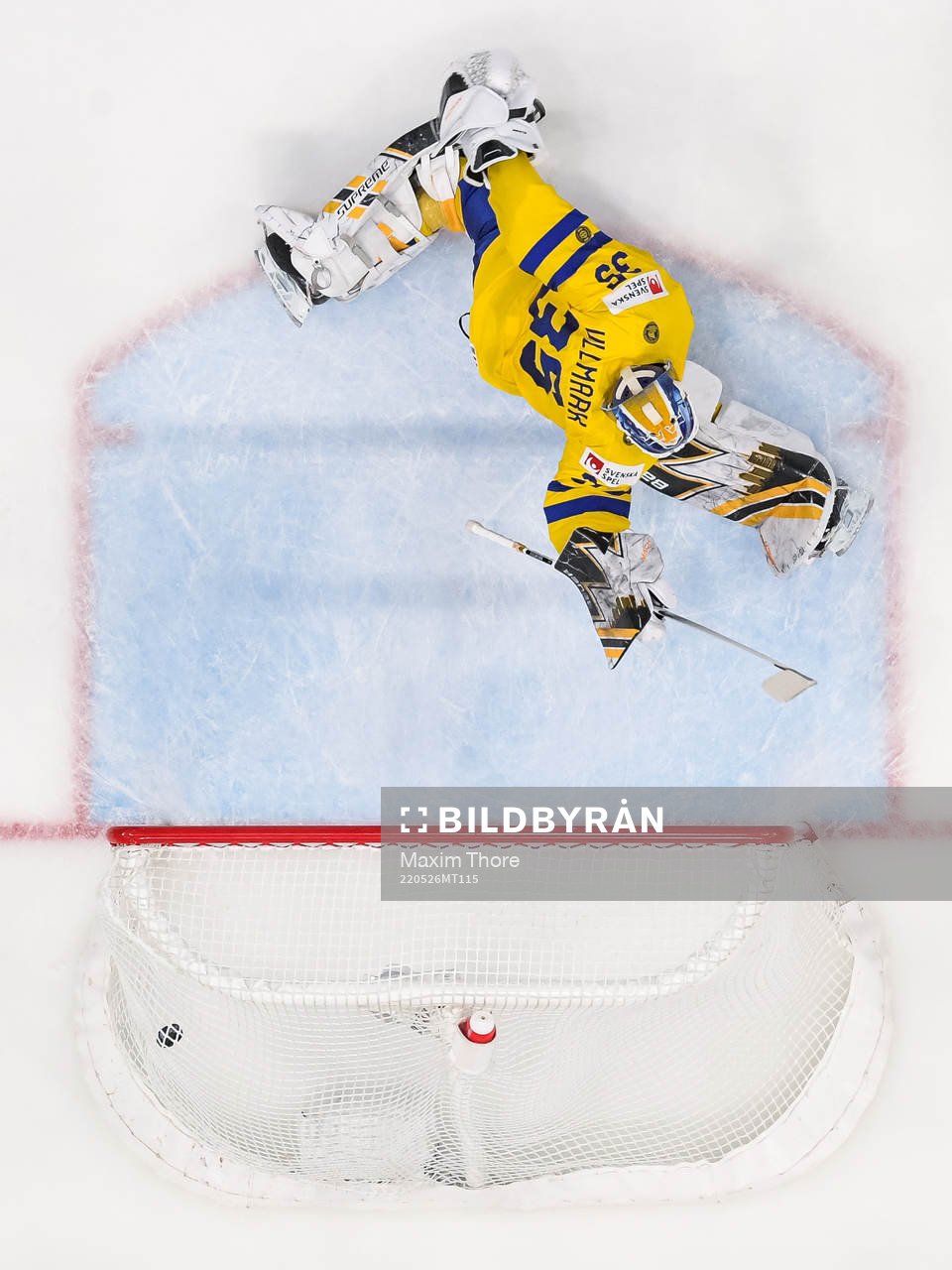 Drake Batherson of Canada (not pictured) scores 3-4 behind