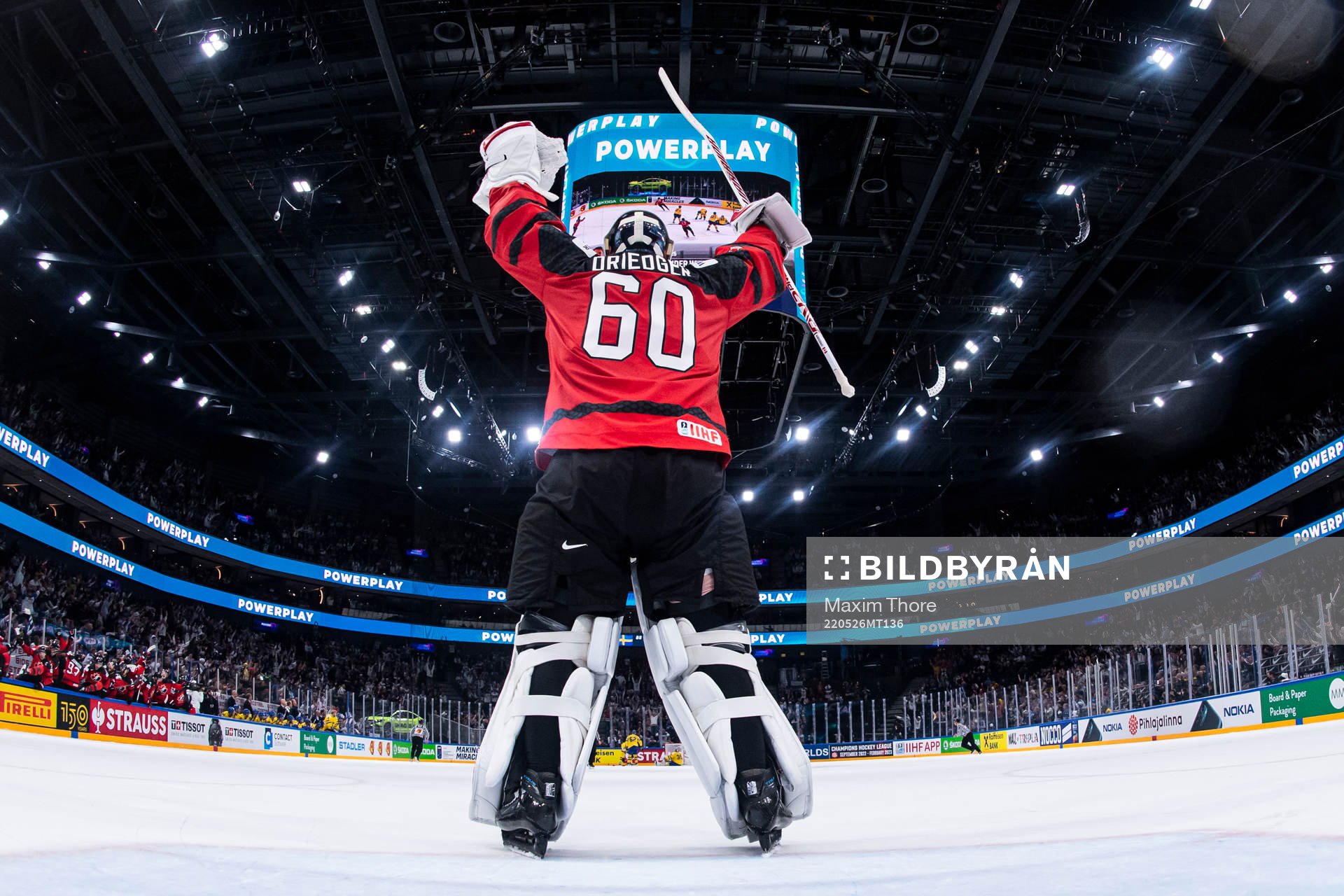 Goaltender Chris Driedger of Canada celebrate the 3-4 goal