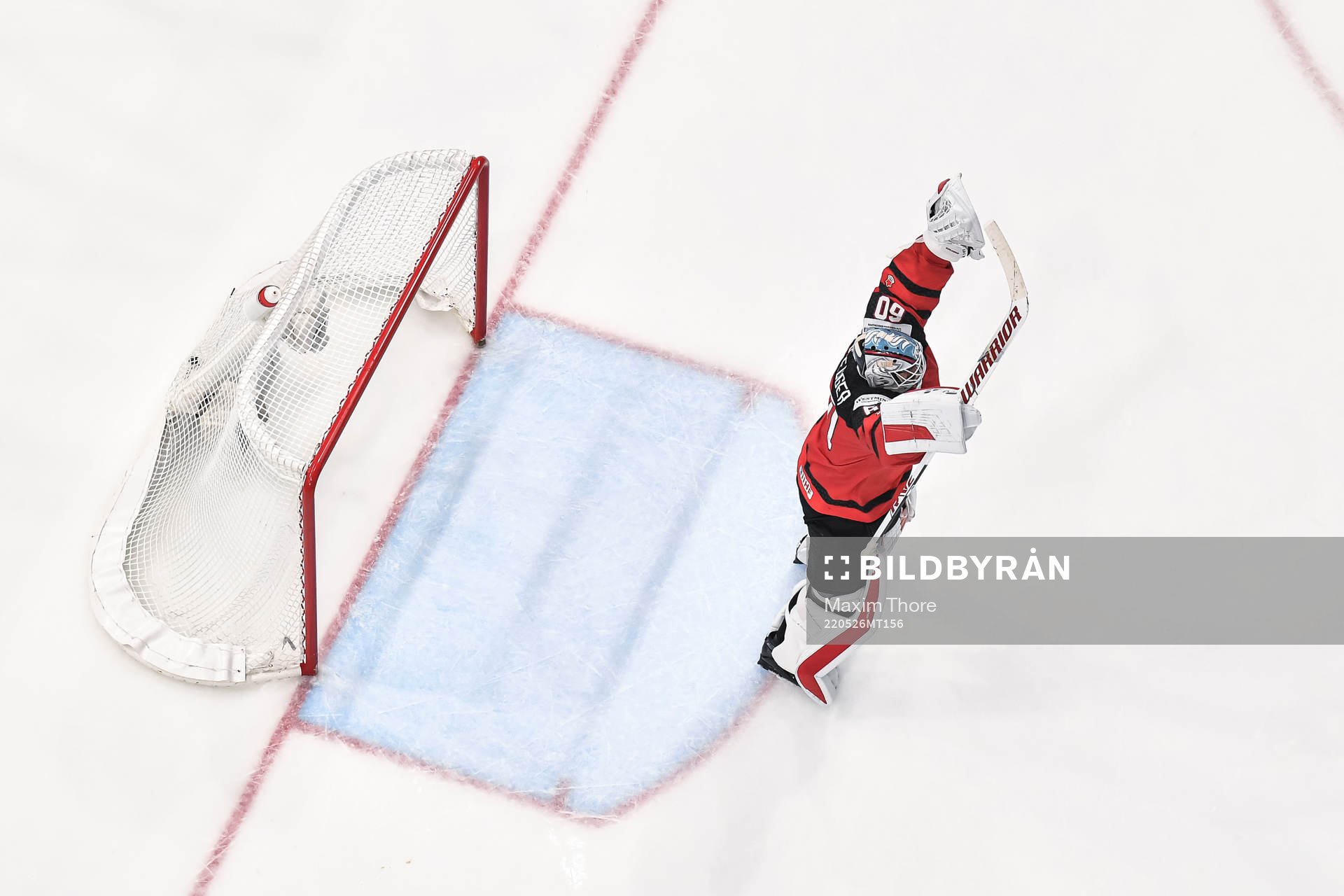 Goaltender Chris Driedger of Canada celebrate the 3-4 goal