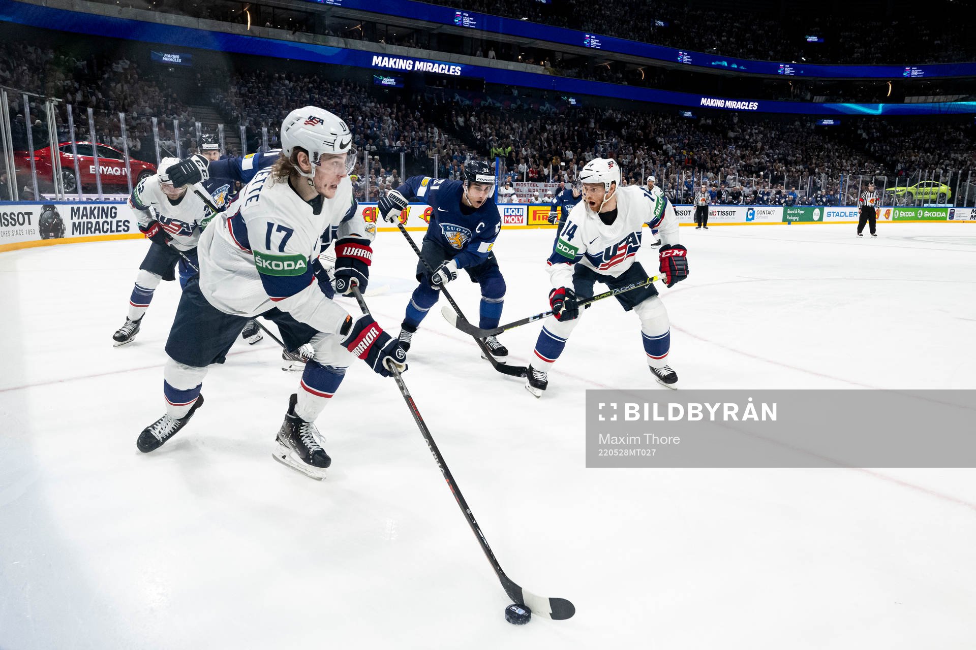 Adam Gaudette of USA and Valtteri Filppula of Finland