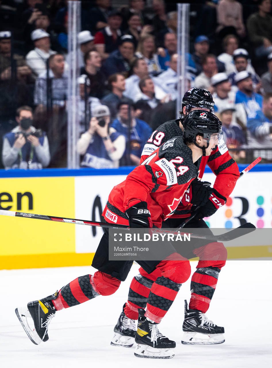 Dylan Cozens of Canada celebrates
