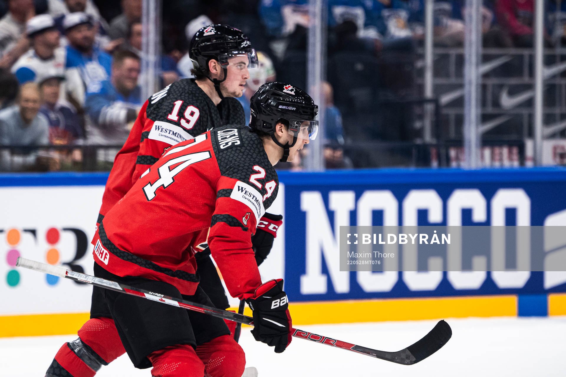 Dylan Cozens of Canada celebrates