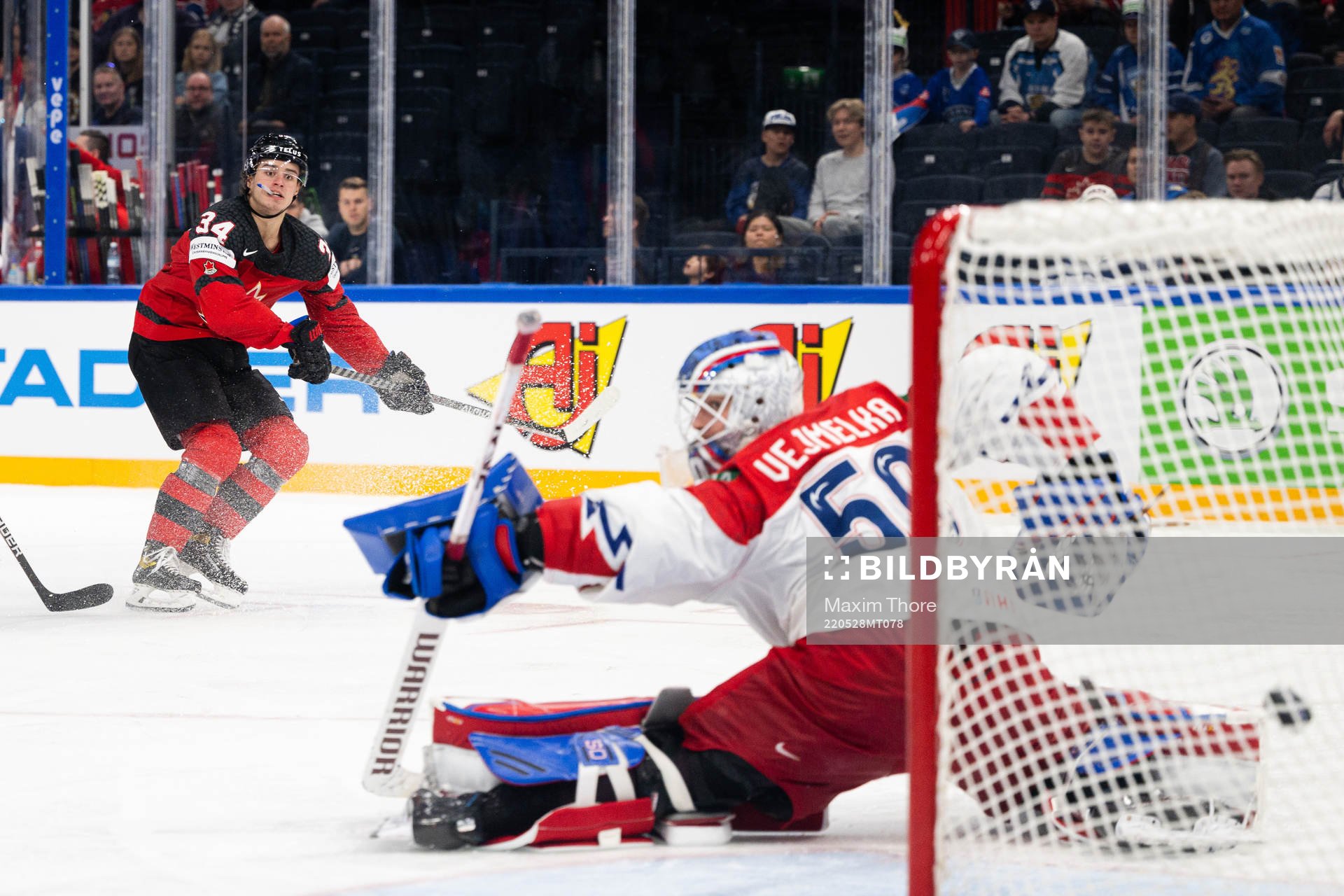 Cole Sillinger of Canada scores the 5-1 goal