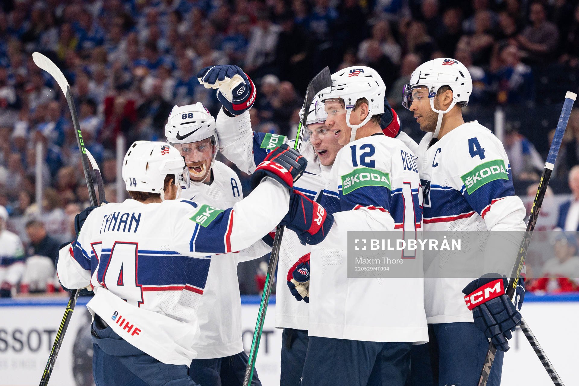 Adam Gaudette of USA celebrates with team-mates