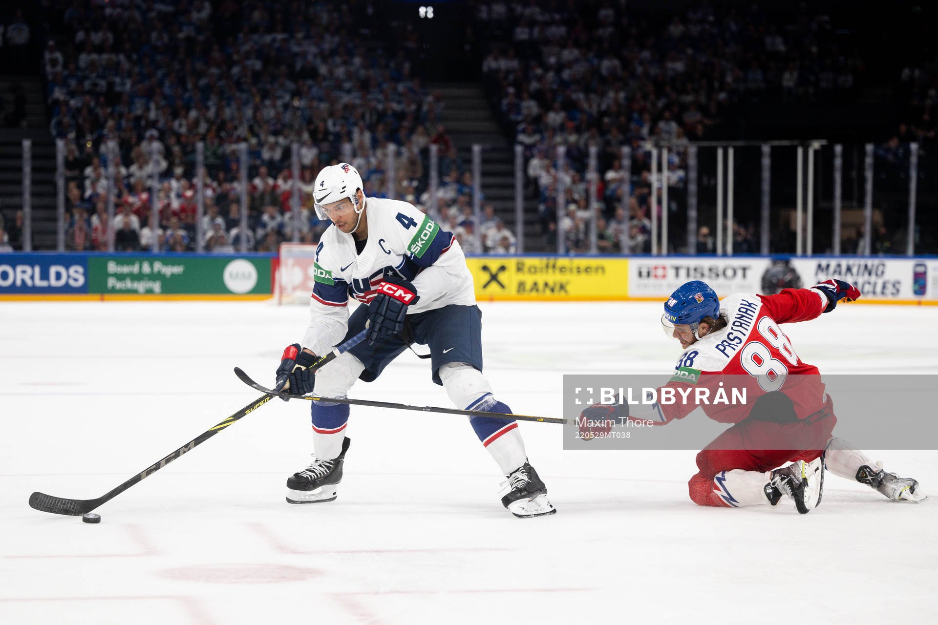 Seth Jones of USA and David Pastrnak of Czech Republic