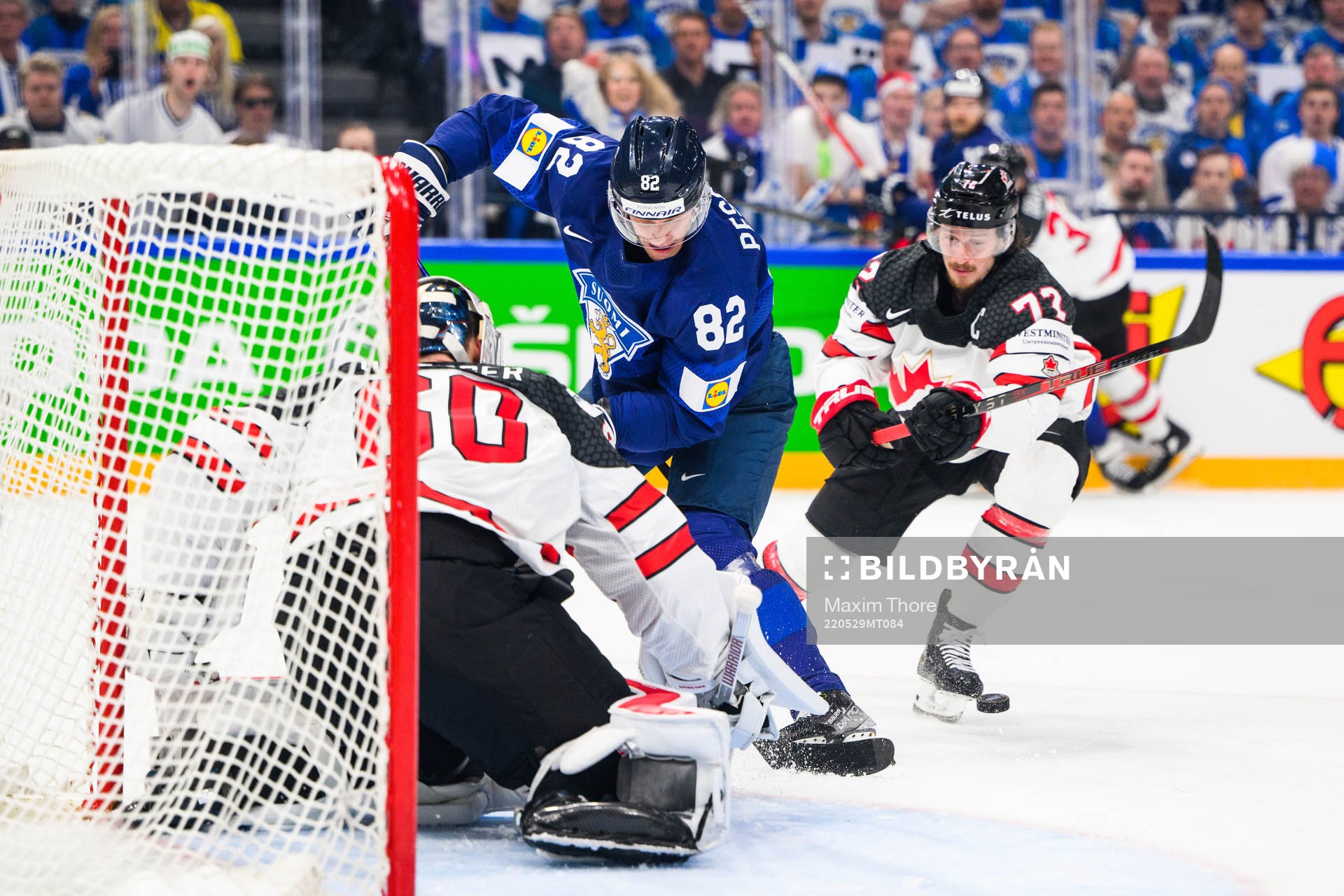 Harri Pesonen of Finland and Thomas Chabot of Canada