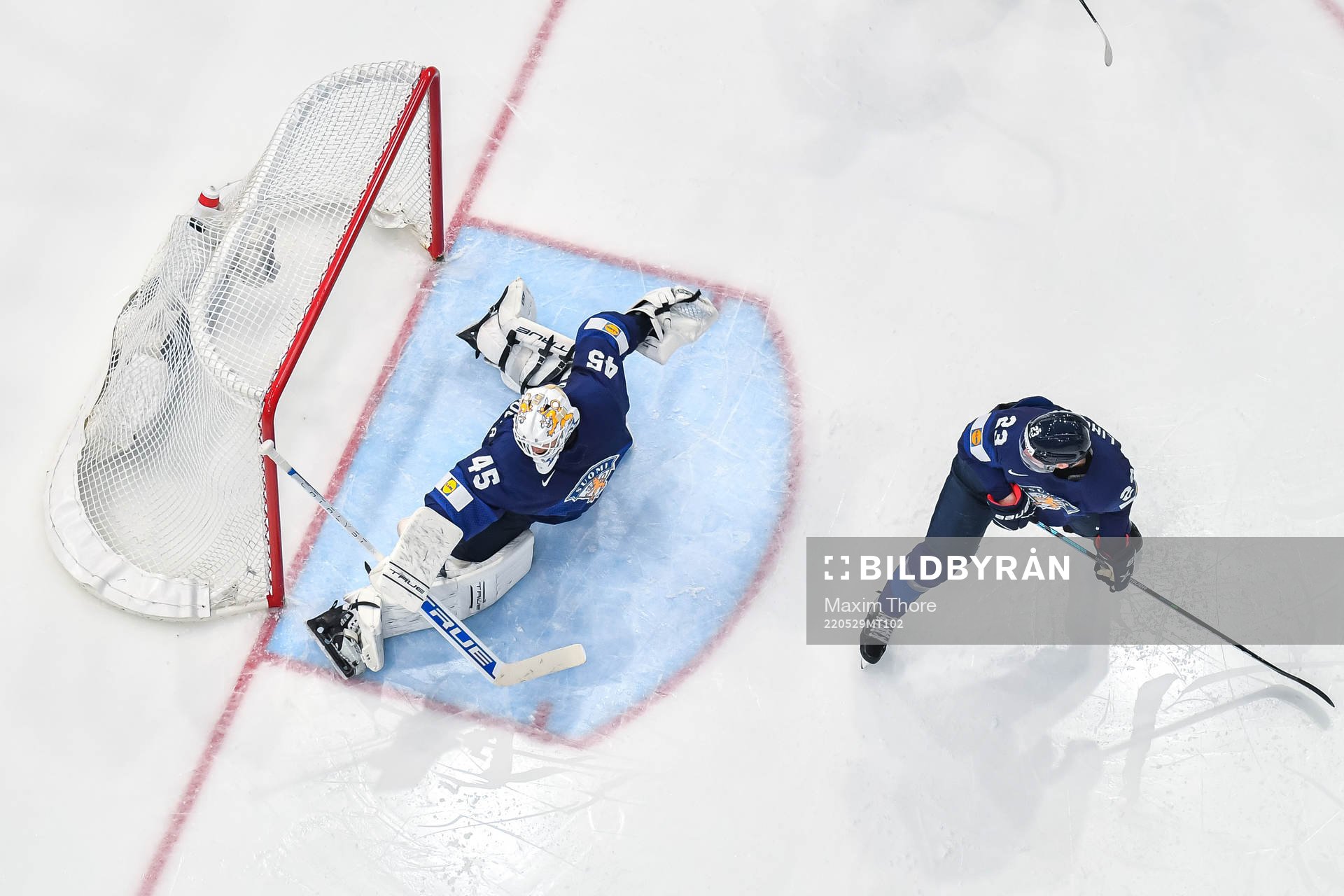 Goaltender Juho Olkinuora of Finland when Dylan Cozens of