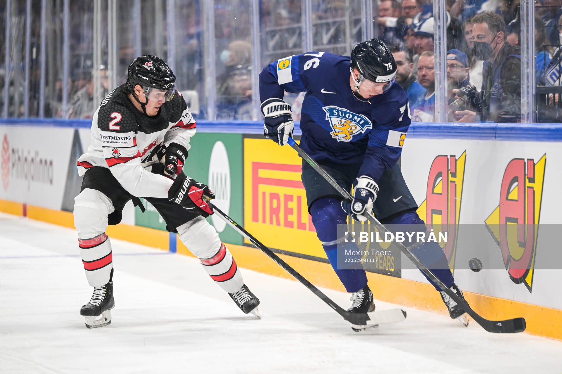 Zach Whitecloud of Canada and Jere Sallinen of Finland
